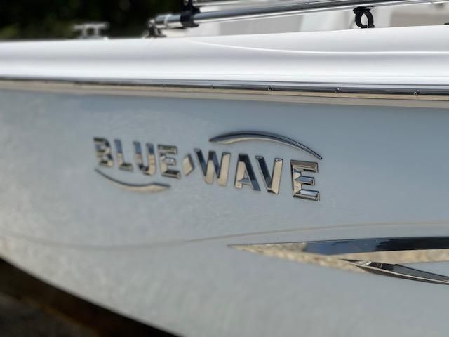 Close-up of 2021 Blue Wave 2200 PureBay boat logo.