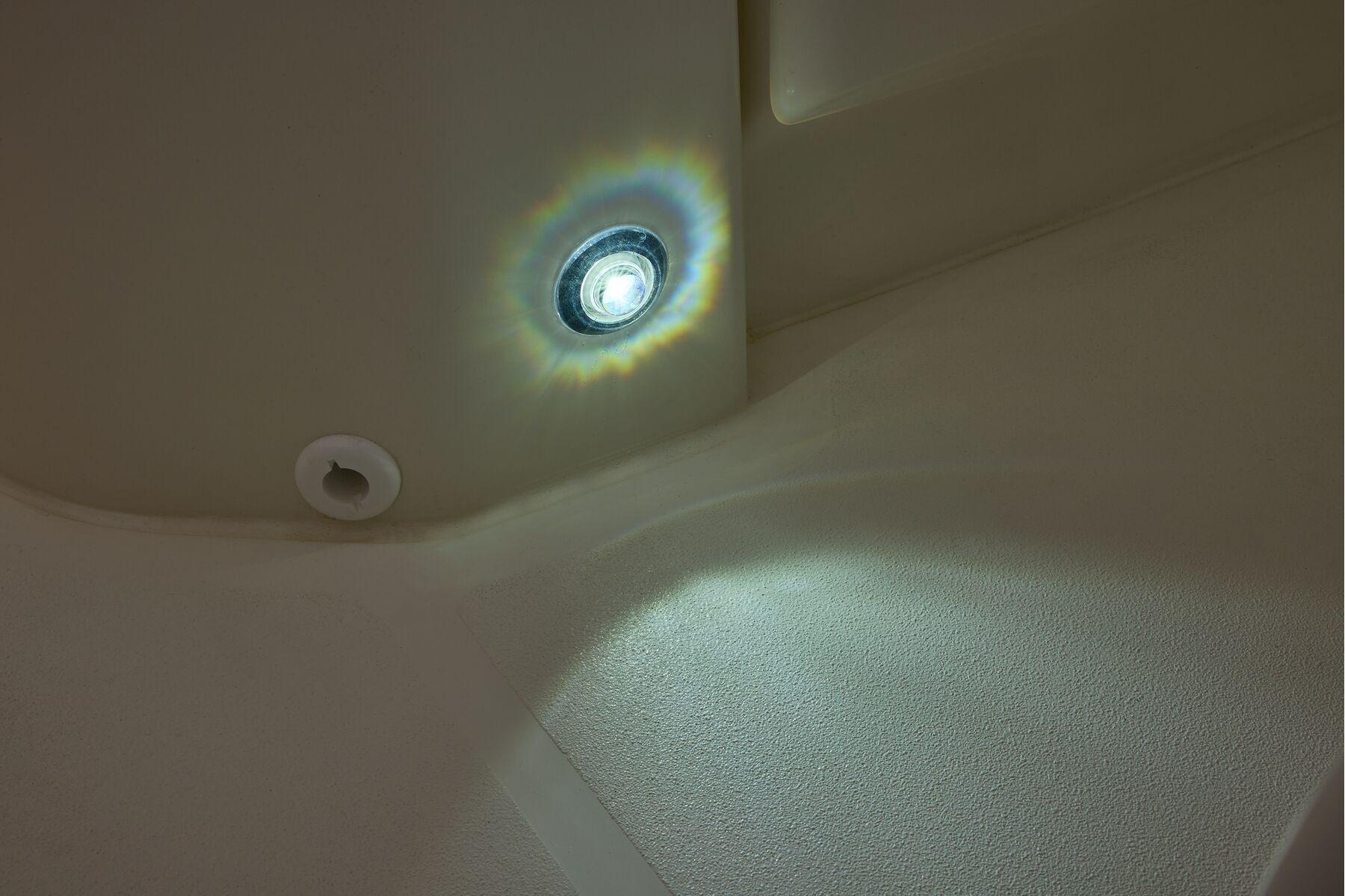LED light detail on 2026 Mako 24 APEX boat interior.