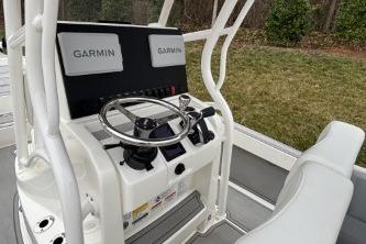 2026 Mako 24 APEX boat dashboard with Garmin navigation system.