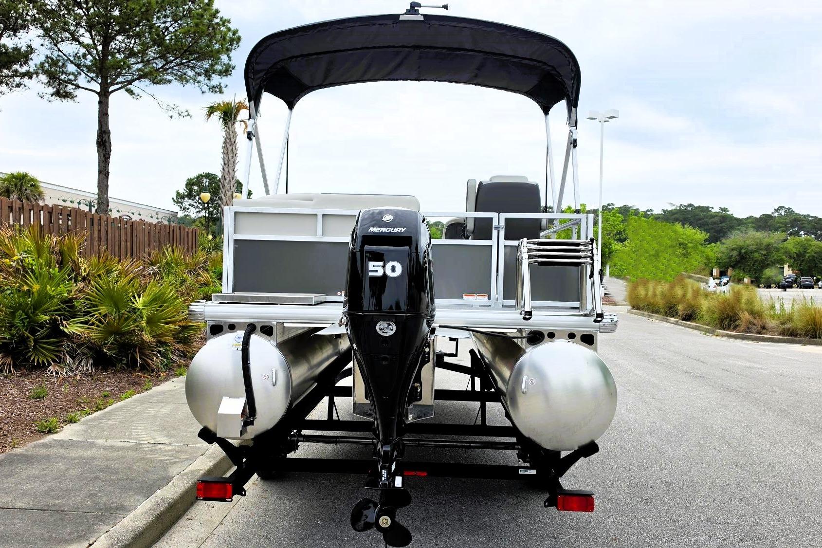 2026 Sun Tracker Bass Buggy 16 XL Select pontoon boat with Mercury 50 engine.