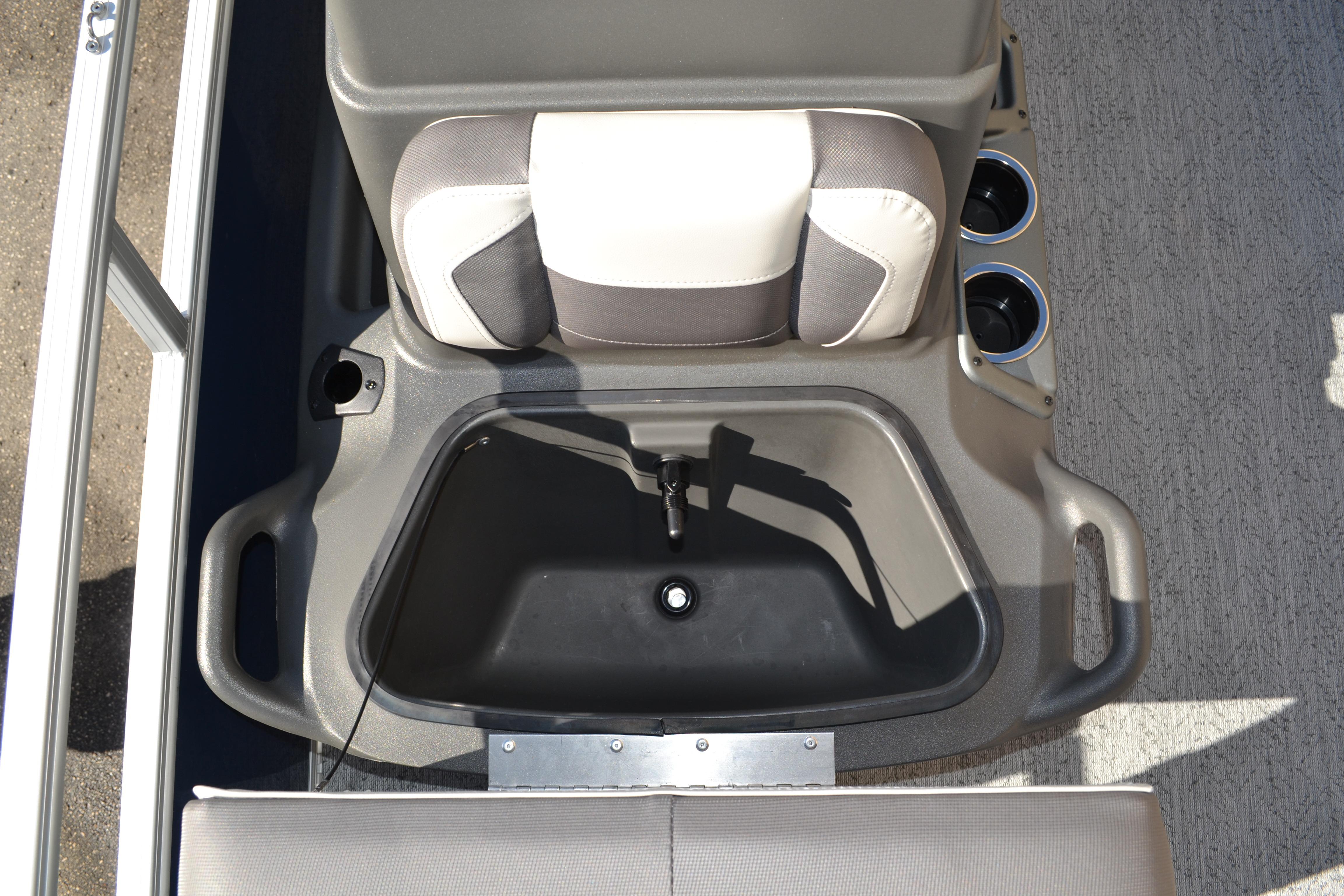 2026 Sun Tracker Bass Buggy 16 XL Select boat seat with storage and cup holders.