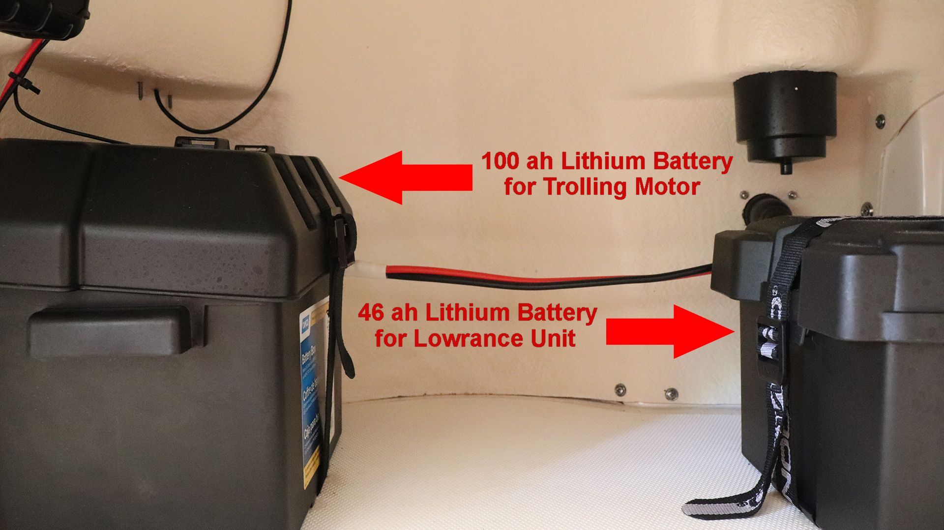 Interior view of a boat with two lithium batteries used for trolling motor and Lowrance unit.