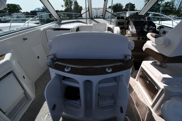 2010 Cruisers Yachts 390 Sports Coupe interior with helm and seating area.