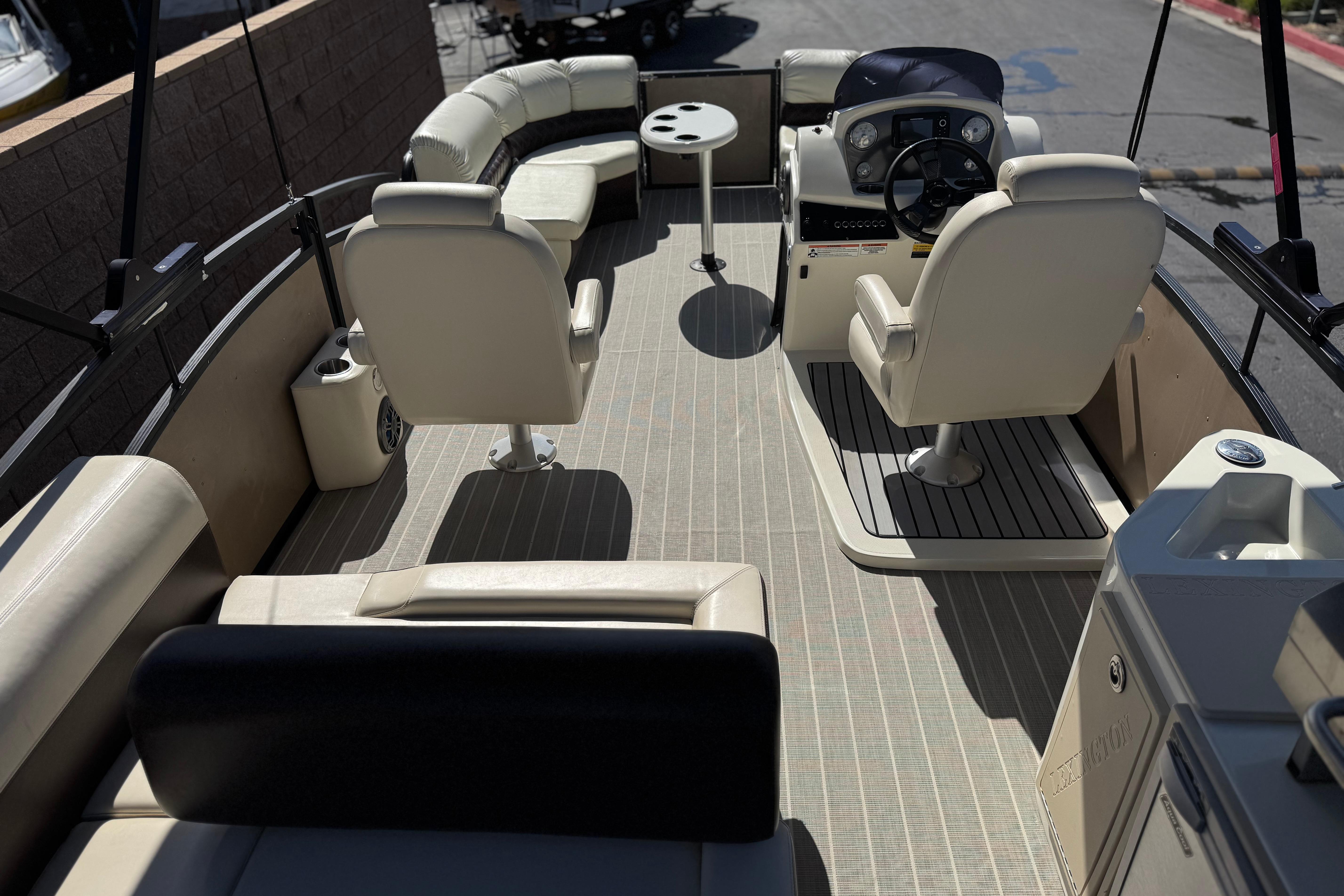 2023 Lexington 623 ST Xtreme boat interior with plush seating and modern helm.