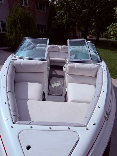 2001 Mariah Shabah with white upholstery and glass windows.