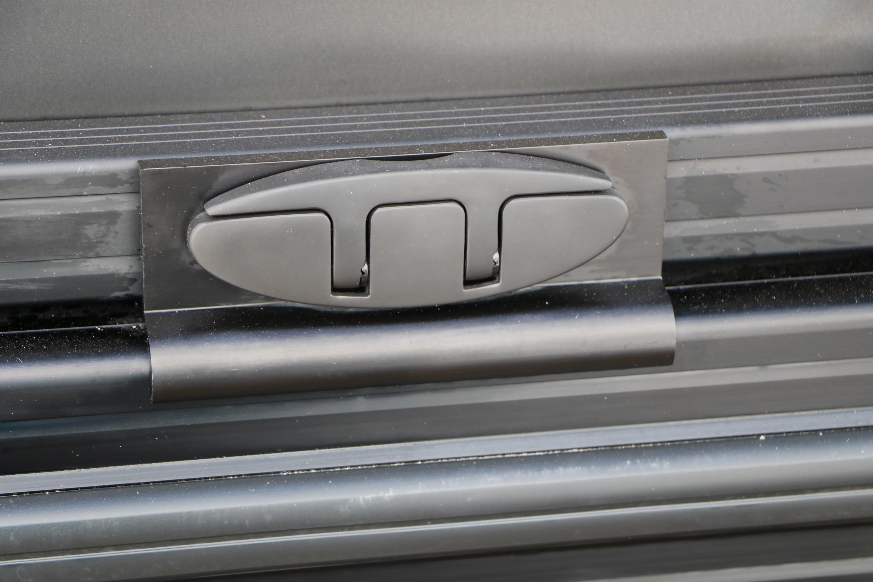 Close-up of Evotti 521QL 2026 vehicle latch mechanism.