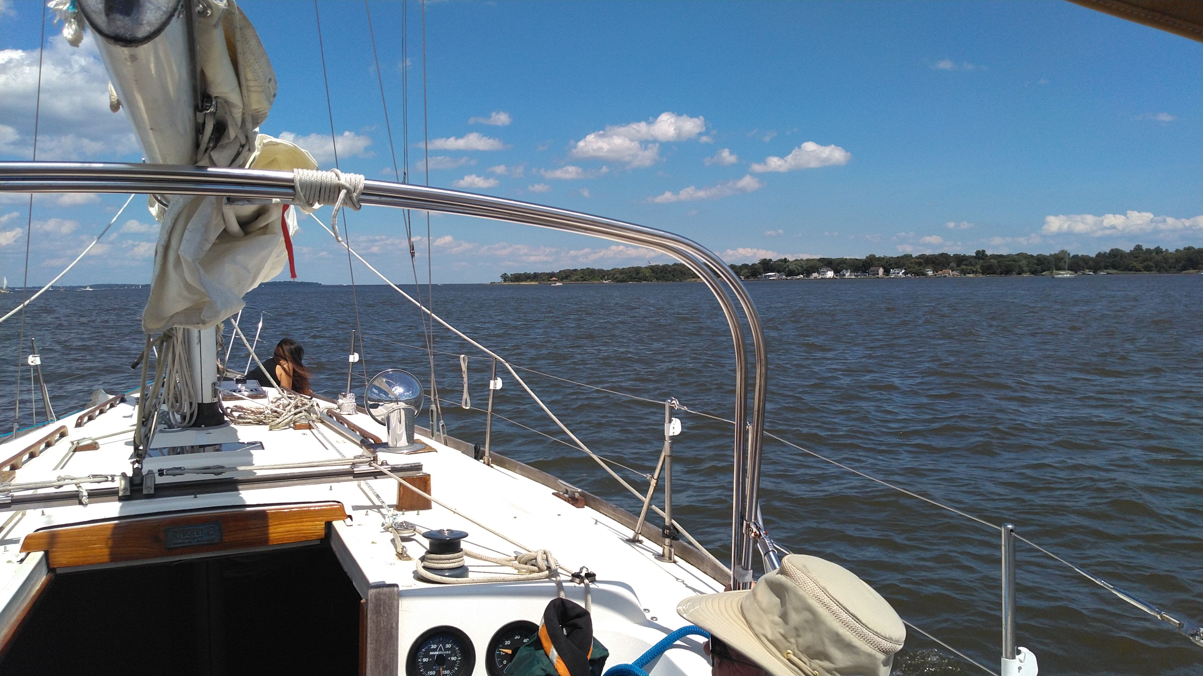 Sailing on a 1978 Tartan 37 under clear skies.