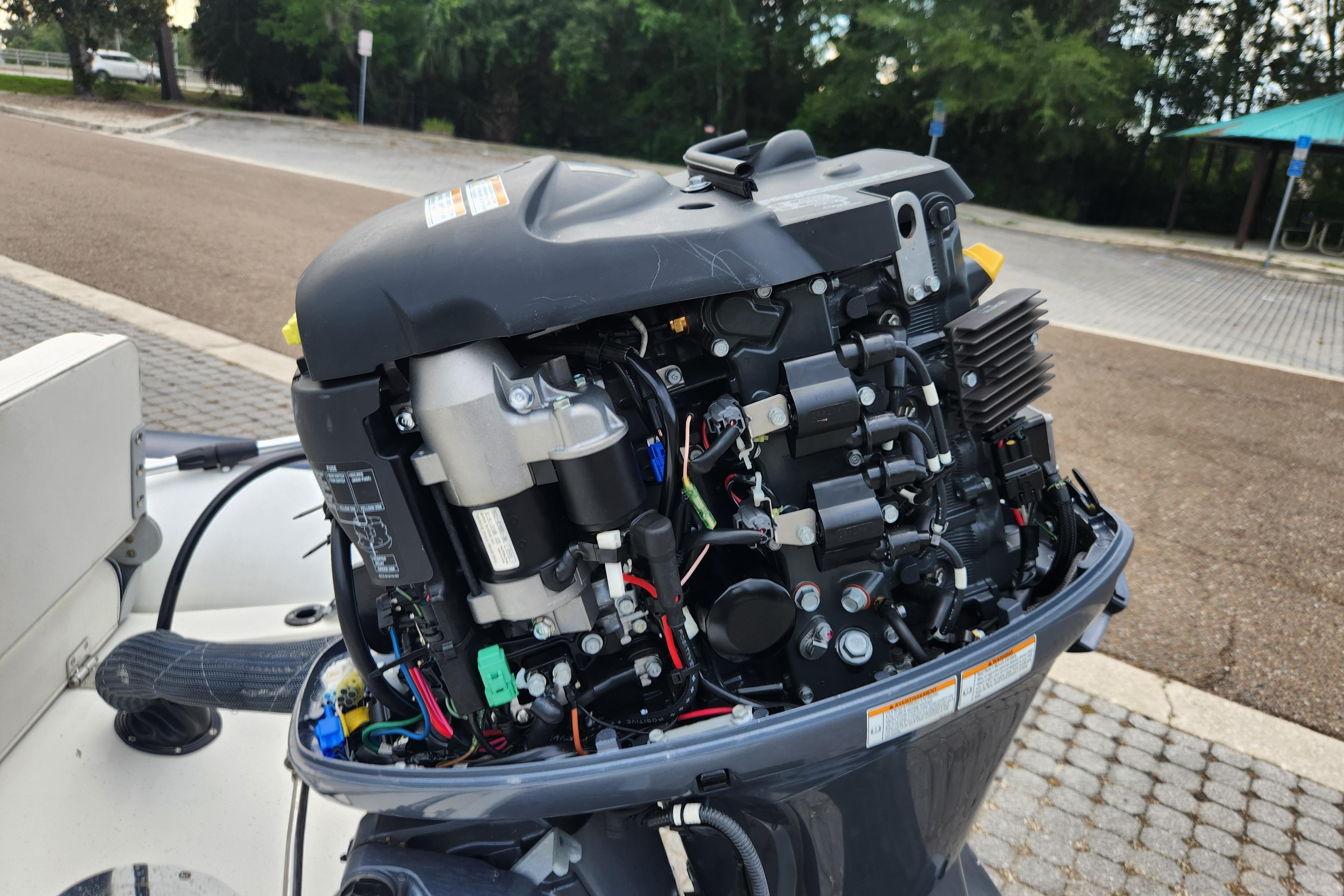 2019 Novurania DL 400 outboard motor with exposed engine components.