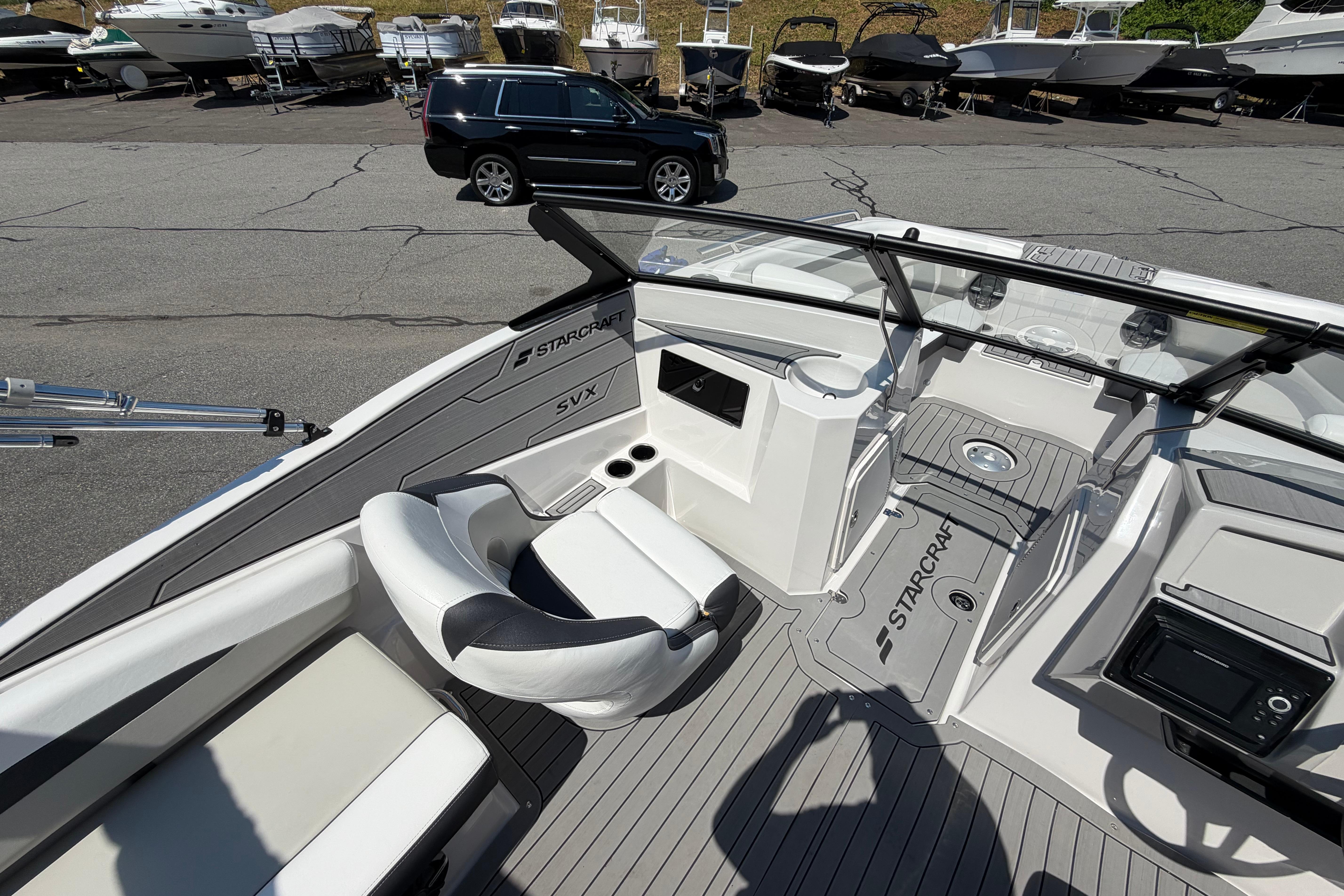2025 Starcraft SVX 190 OB boat interior with sleek seating and modern dashboard design.