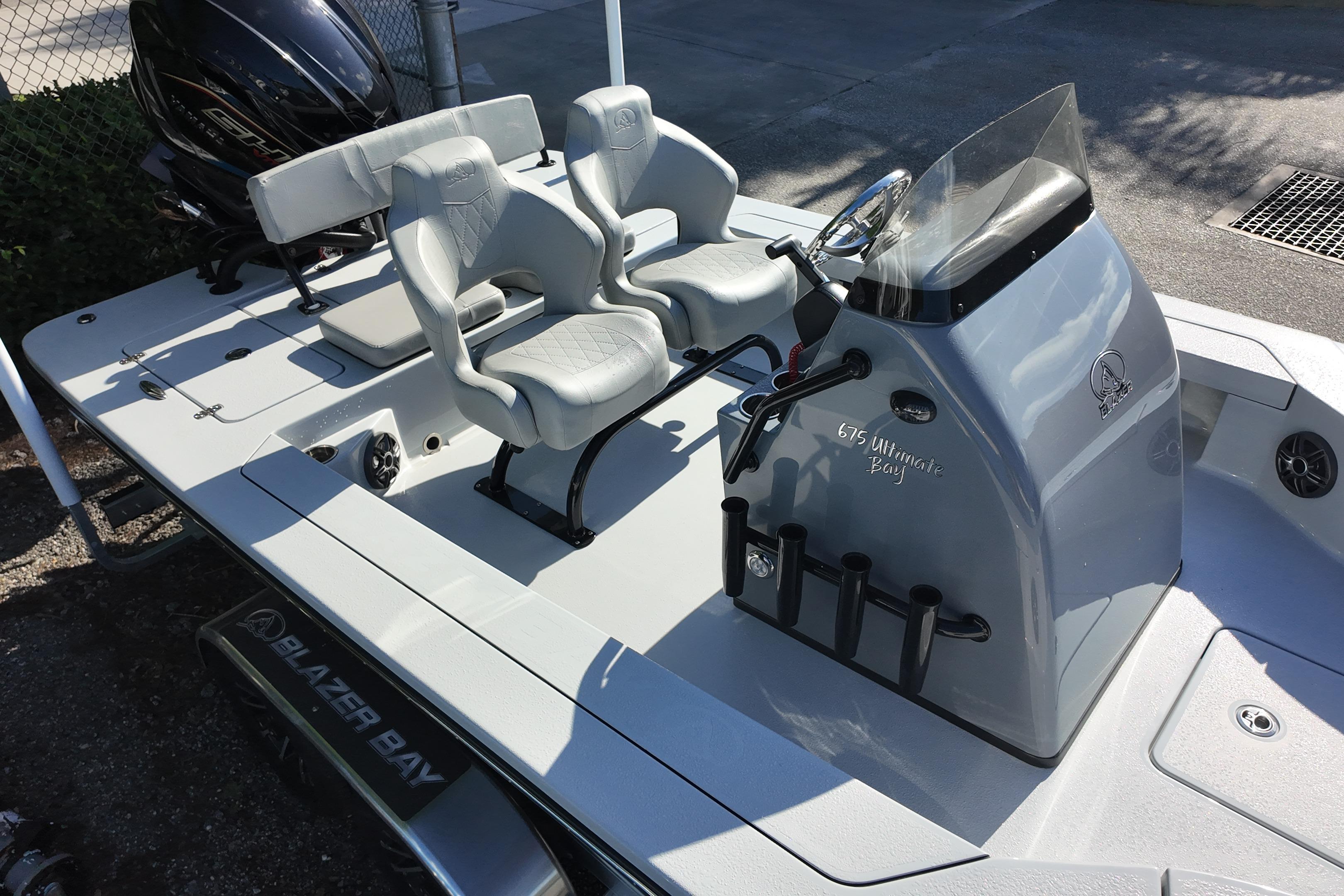 2026 Blazer Bay 675 Ultimate Bay boat interior with dual seats and control console.