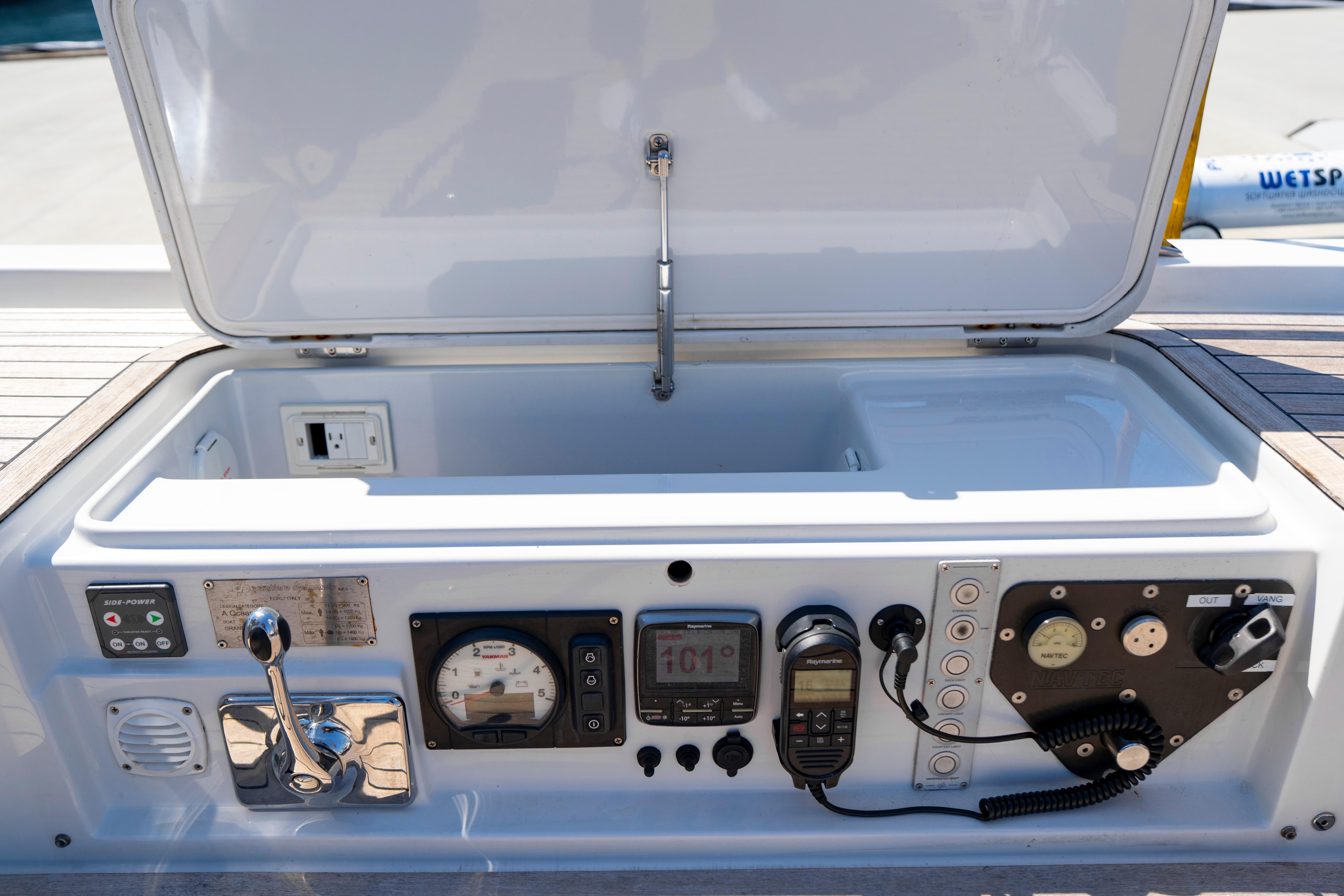 Control panel of a 2016 Grand Soleil 58 yacht, featuring navigation and communication instruments.