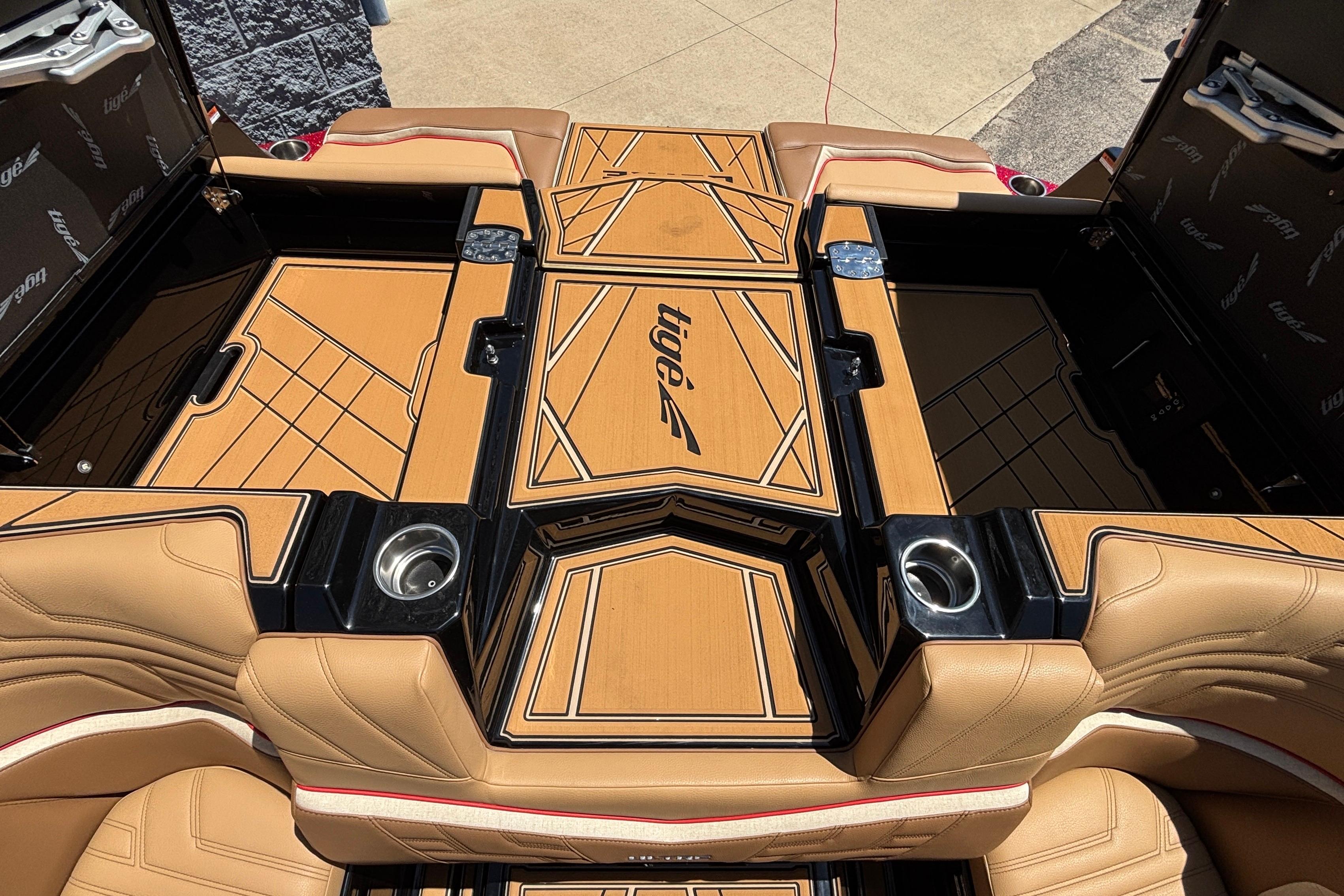 2026 Tigé Ultré 25ZX boat interior with tan upholstery and sleek design.
