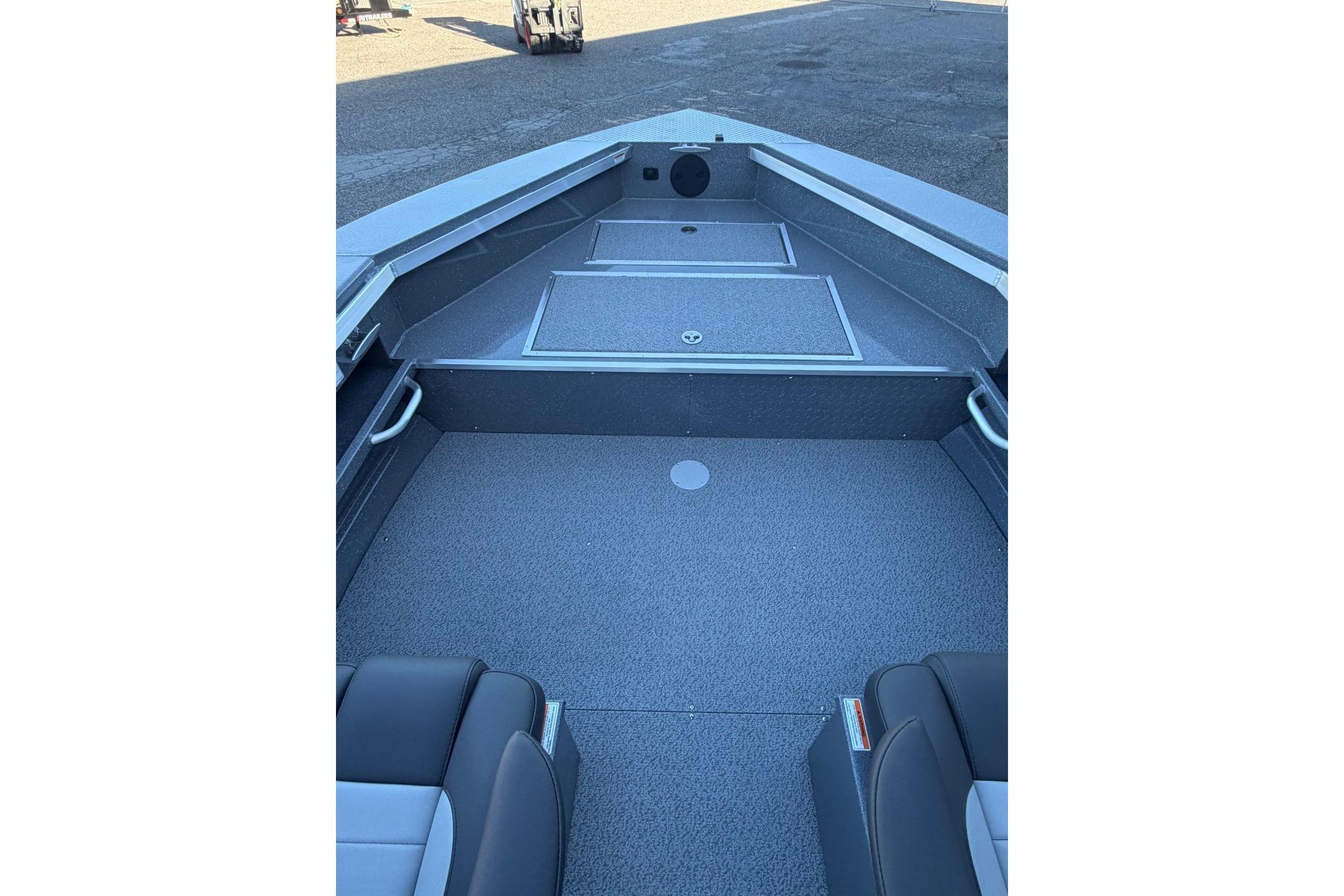 2026 Thunder Jet 209 Rush OT boat interior with spacious seating and storage compartments.