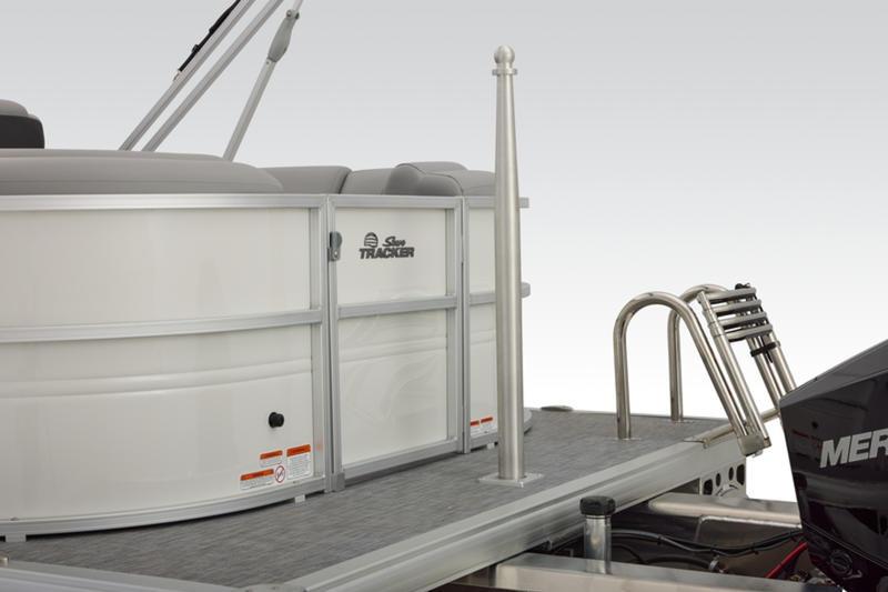 2026 Sun Tracker Party Barge 22 DLX pontoon boat rear view with motor and ladder.