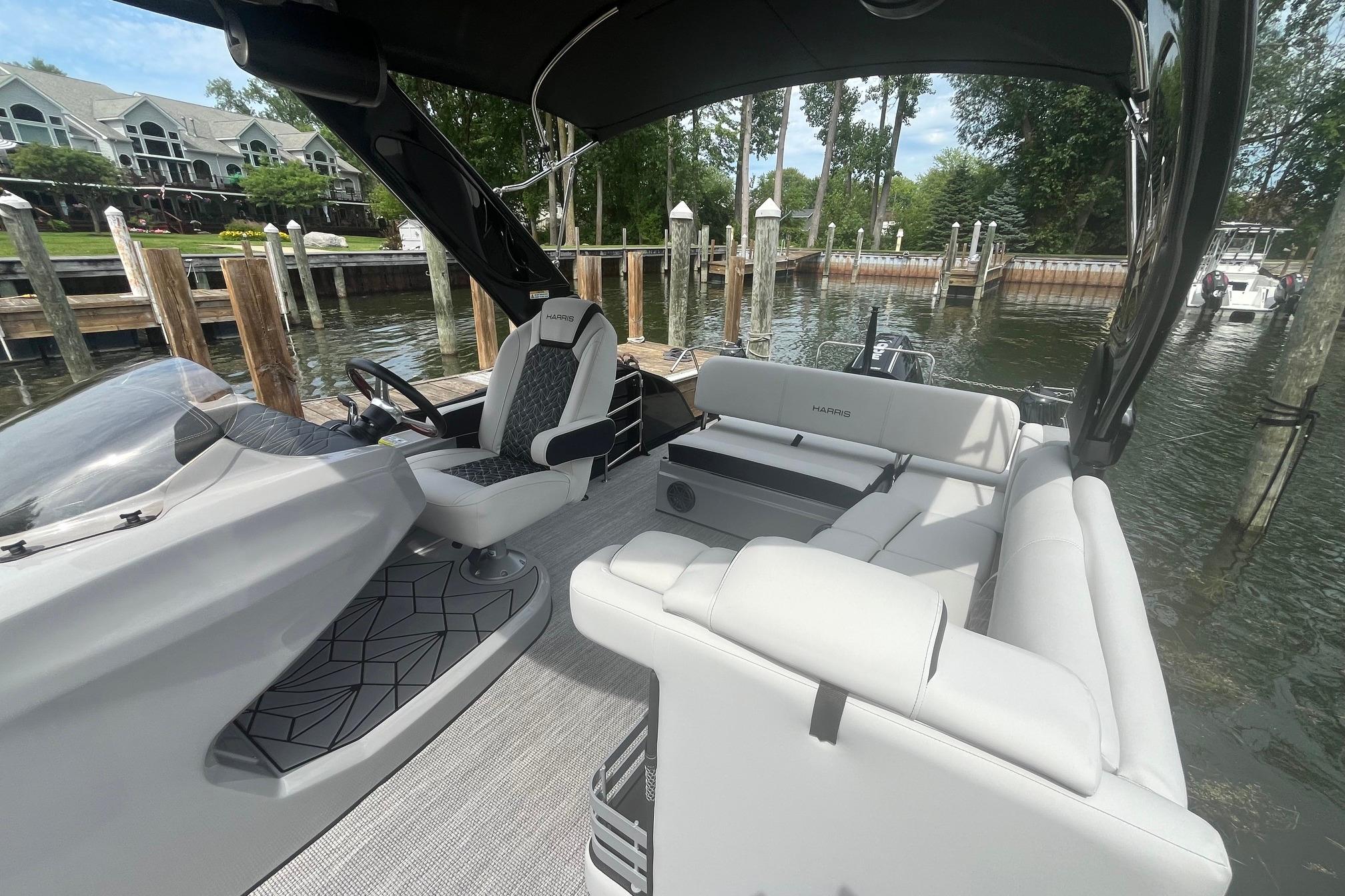 2024 Harris Grand Mariner 250 pontoon boat interior with luxurious seating and modern design.