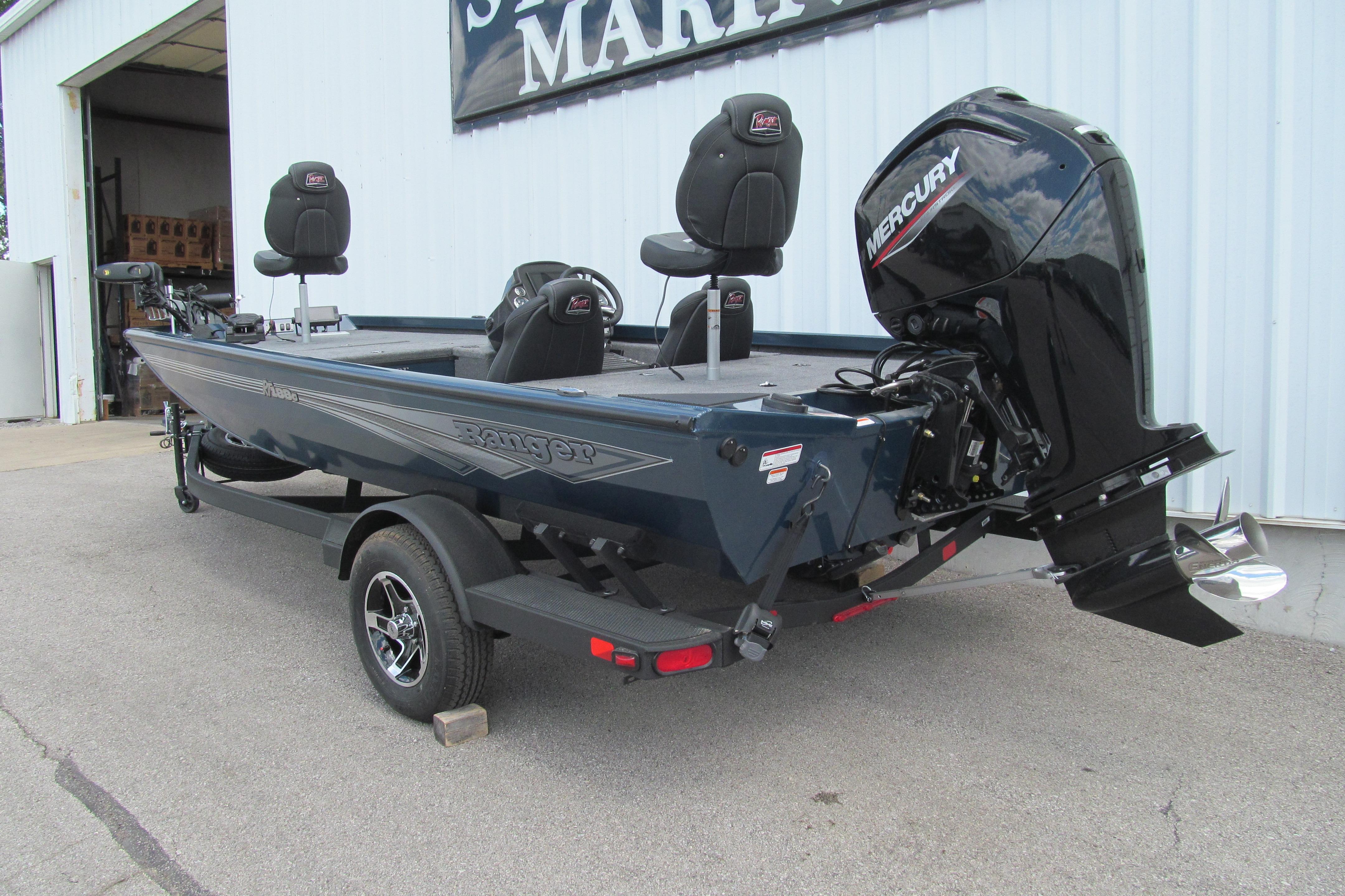 2026 Ranger RT188C fishing boat with Mercury outboard motor, parked on trailer.
