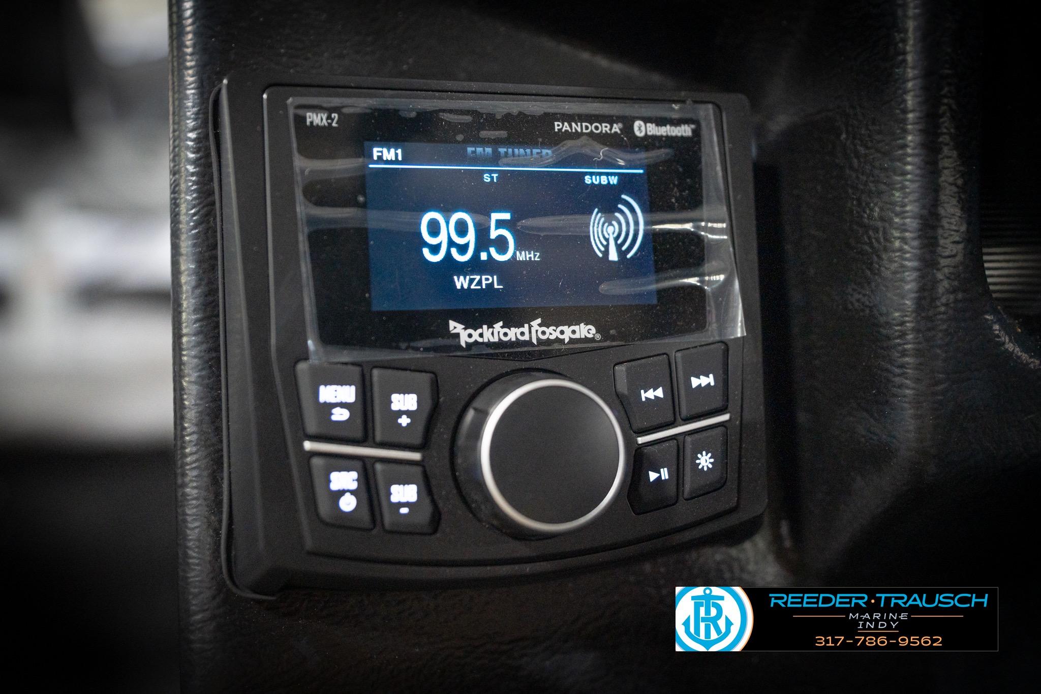 Rockford Fosgate PMX-2 stereo in 2026 Lund 2275 Baron boat, tuned to 99.5 FM.
