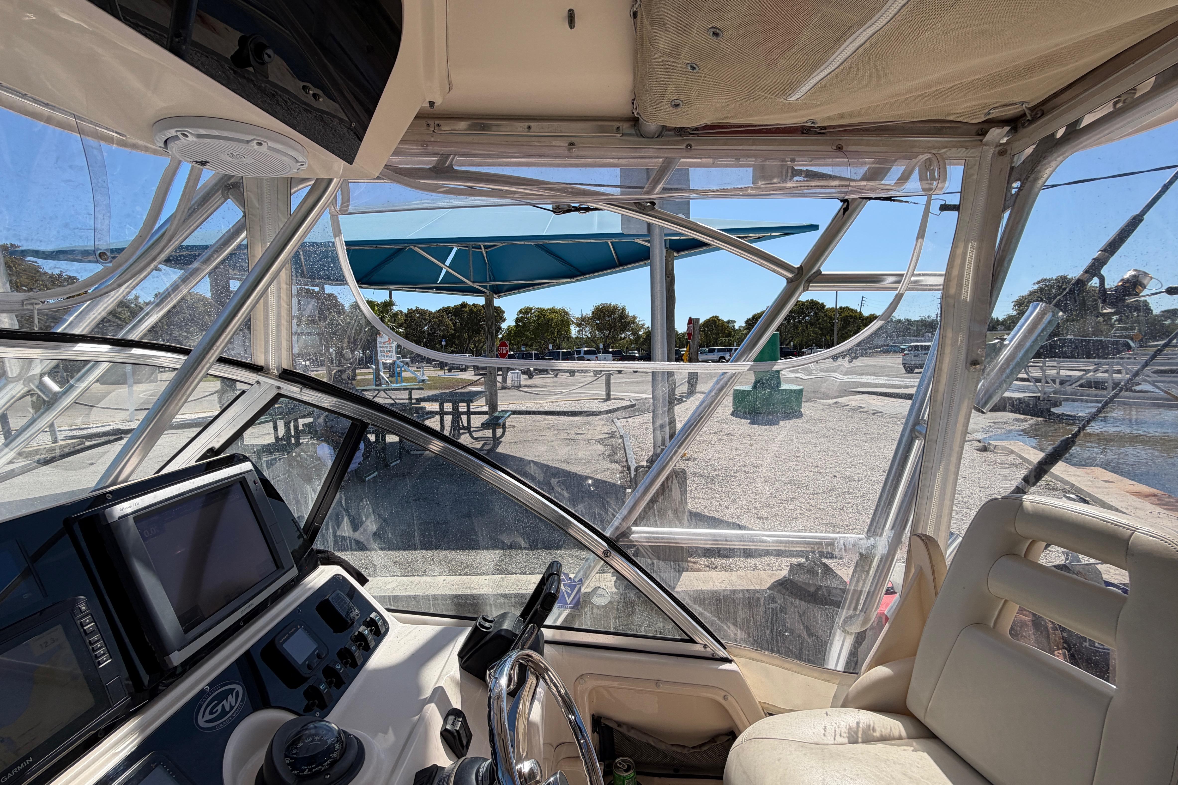 Interior view of a 2006 Grady-White Sailfish 282 boat at a marina.