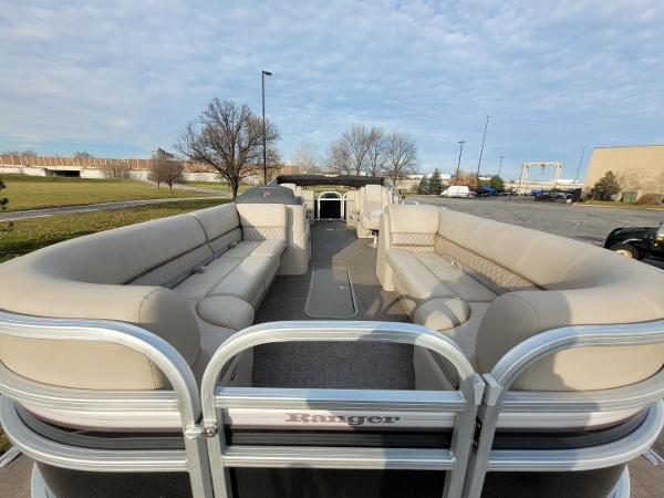 2023 Ranger Reata 243C pontoon boat with spacious seating and modern design.