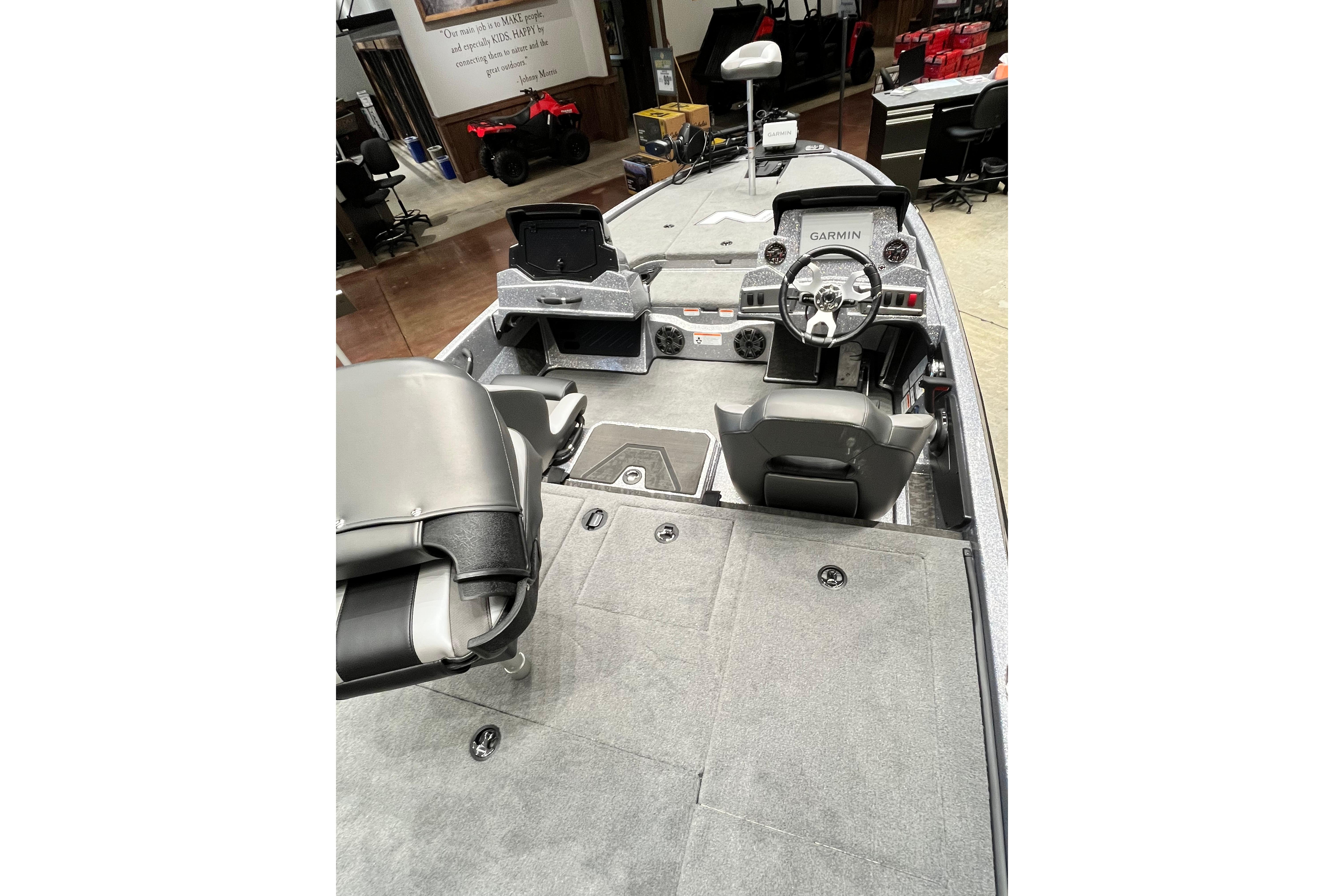 2026 Nitro Z19 XL Pro boat interior with Garmin dashboard and seating.