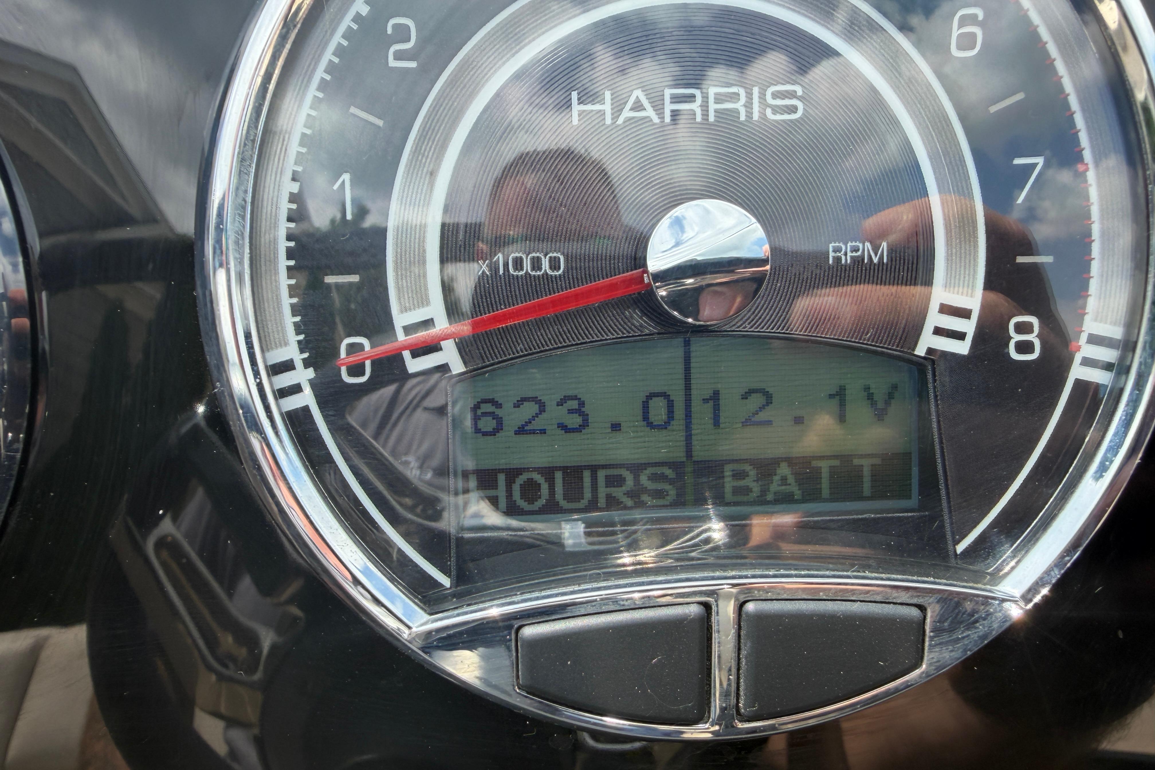 Close-up of 2019 Harris Solstice 240 RPM gauge displaying 623 hours and 12.1V battery.