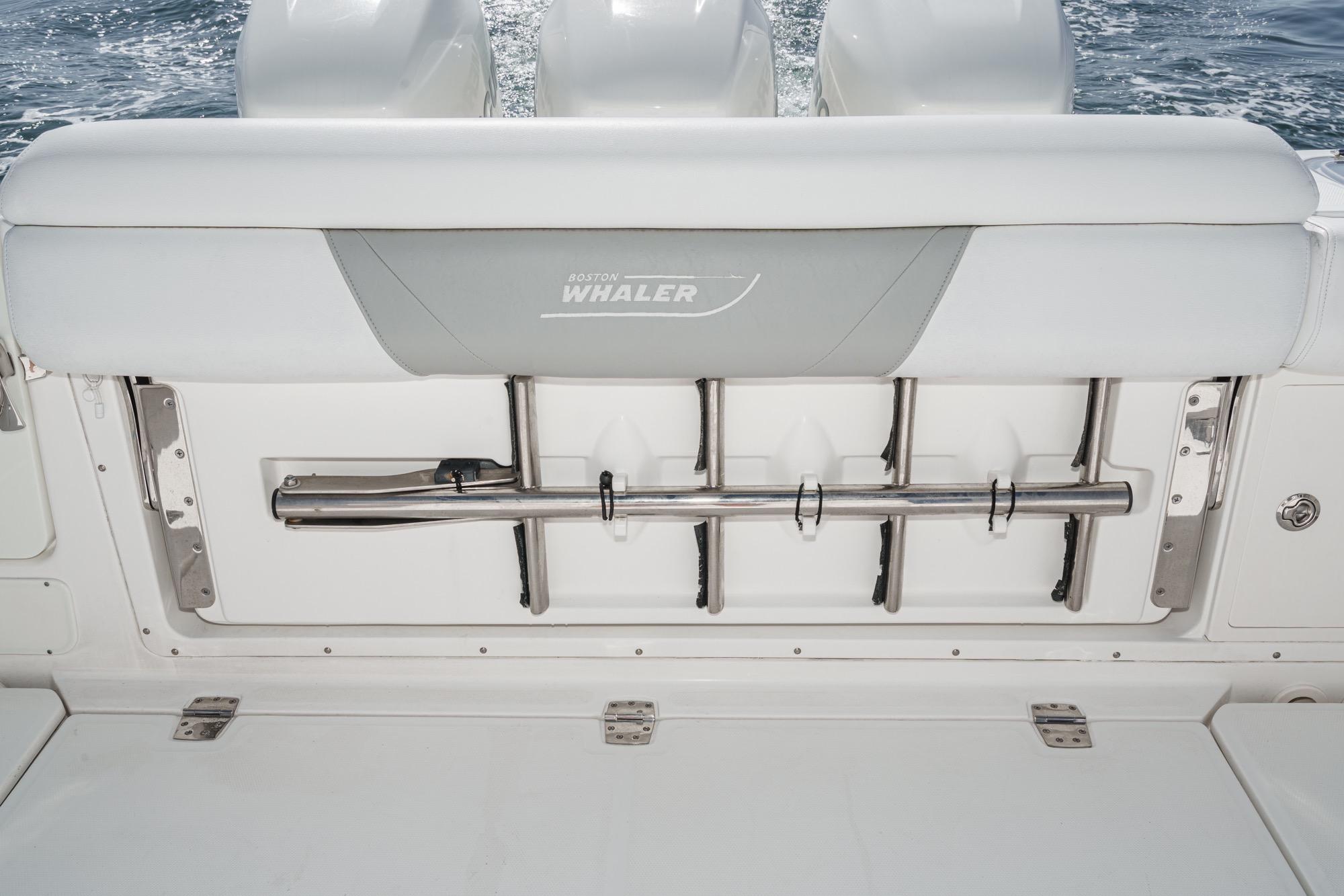 2015 Boston Whaler 370 Outrage boat seating with integrated rod holders.
