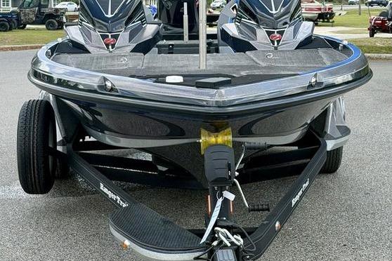 2023 Ranger Z520R boat on trailer, sleek design, dual motors, parked outdoors.