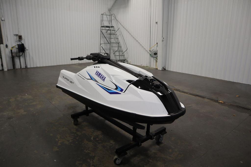 2025 Yamaha WaveRunner SuperJet in a garage, showcasing sleek design and modern features.