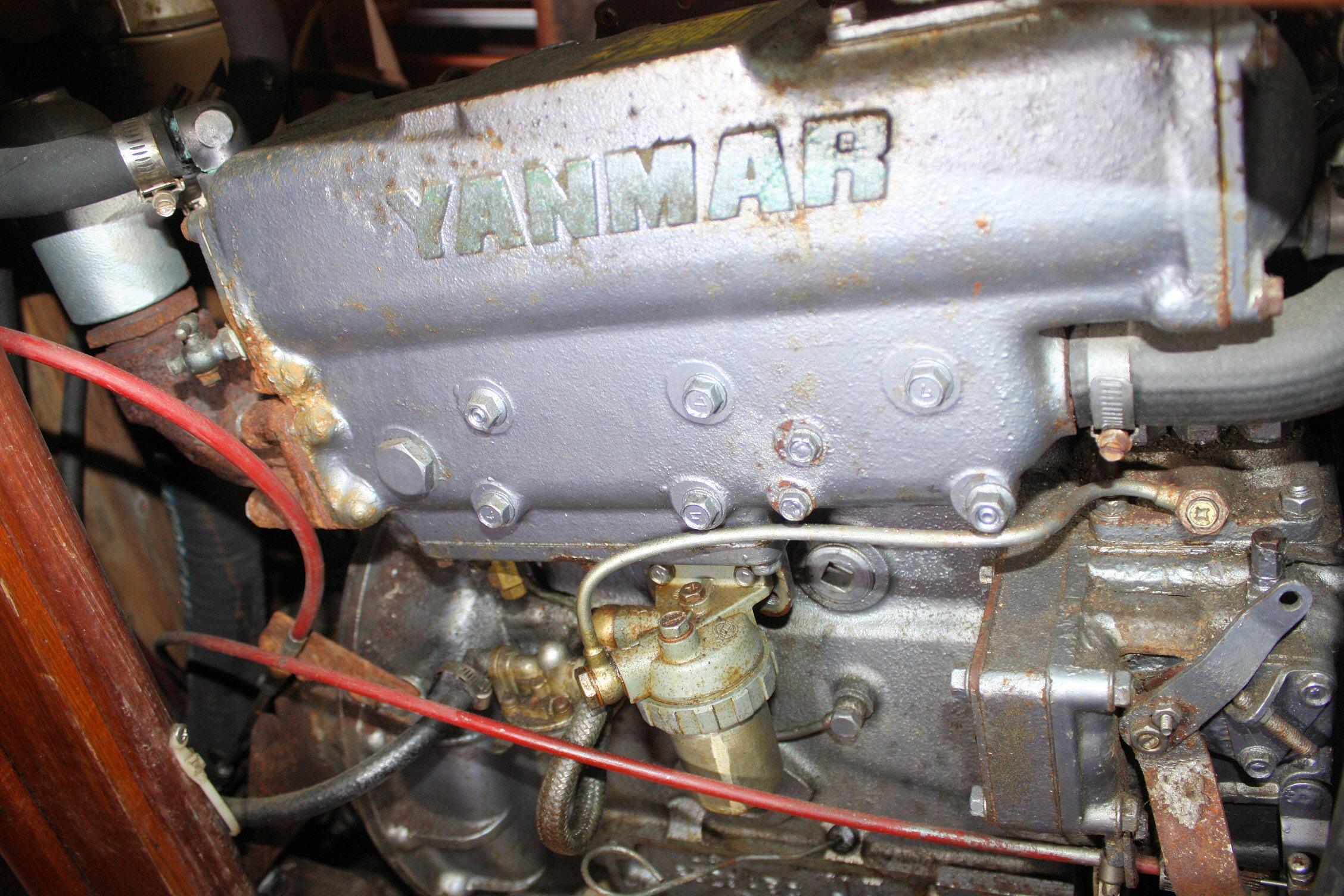 Yanmar engine in a 1987 Ericson 38-200 sailboat, showing detailed components.