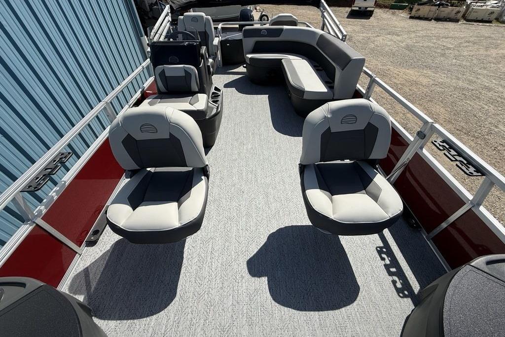 2026 Sun Tracker Bass Buggy 18 DLX pontoon boat with spacious seating and modern design.