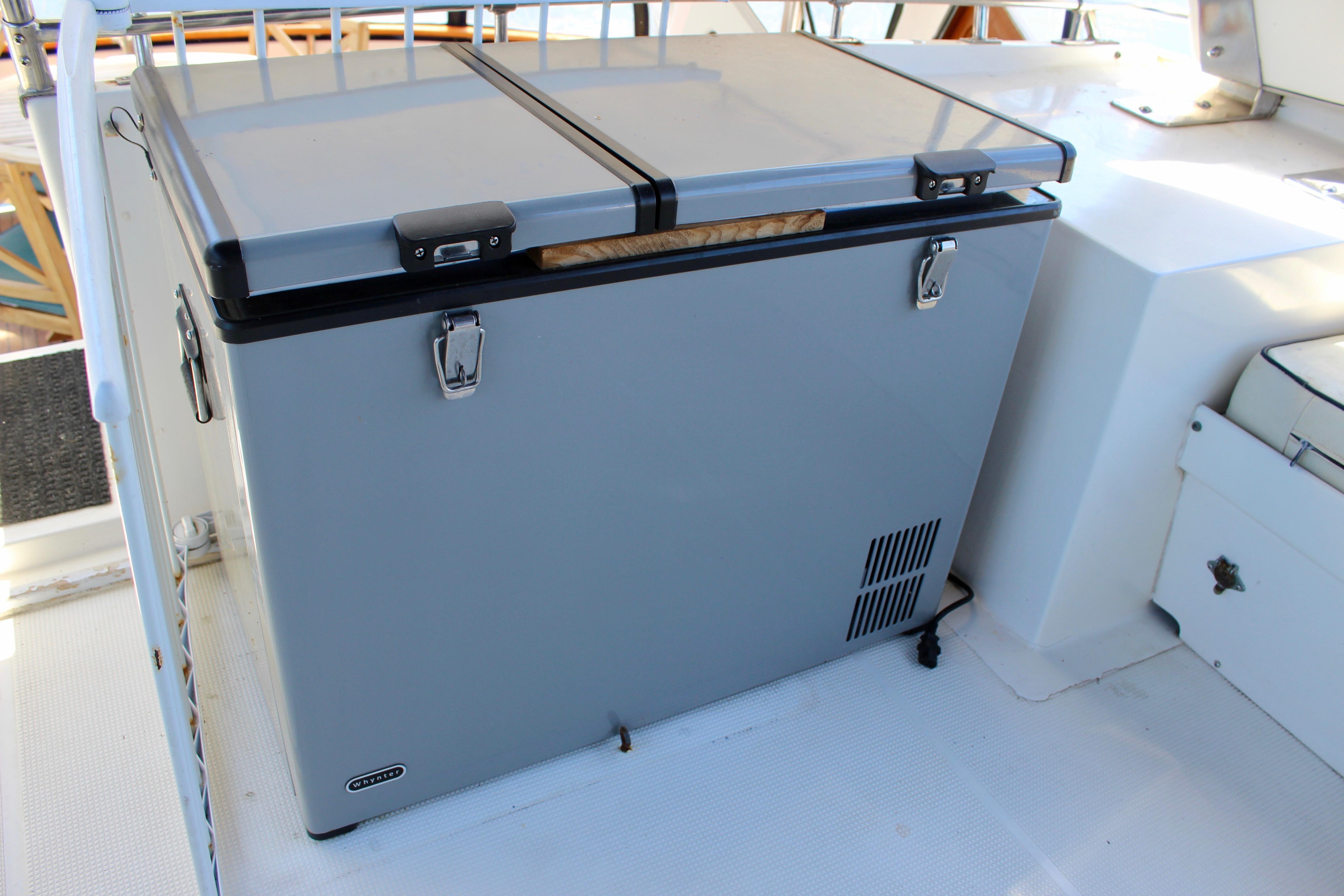 Large gray storage unit on 1986 Kha Shing Spindrift 46 yacht deck.
