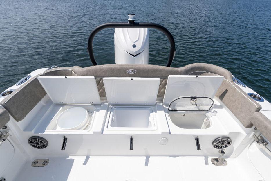 Manufacturer Provided Image: 2026 Sea Hunt Ultra 255 SE boat interior with open storage compartments on calm water.