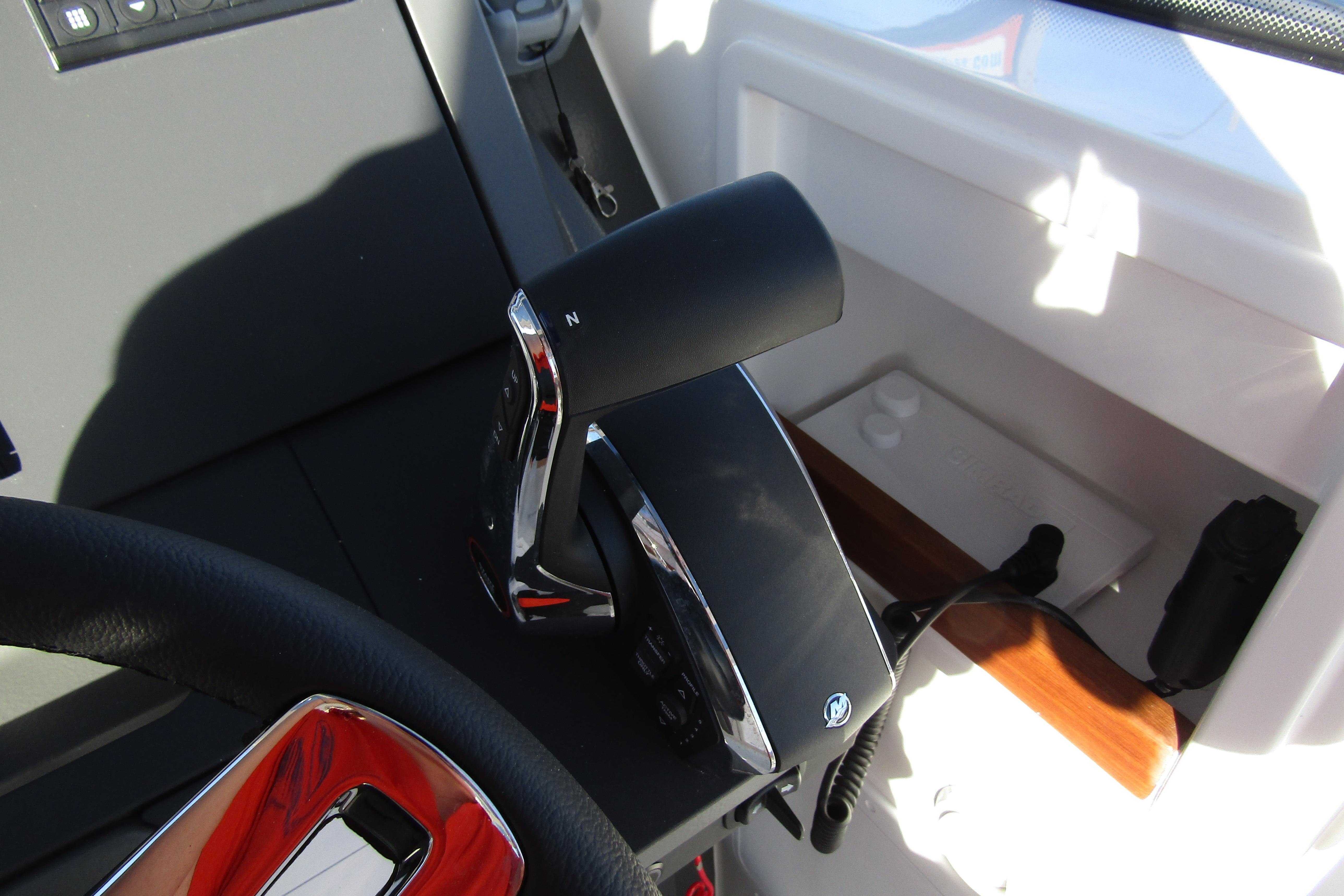 Control lever of 2025 Nimbus Tender 9 boat, featuring sleek design and modern technology.