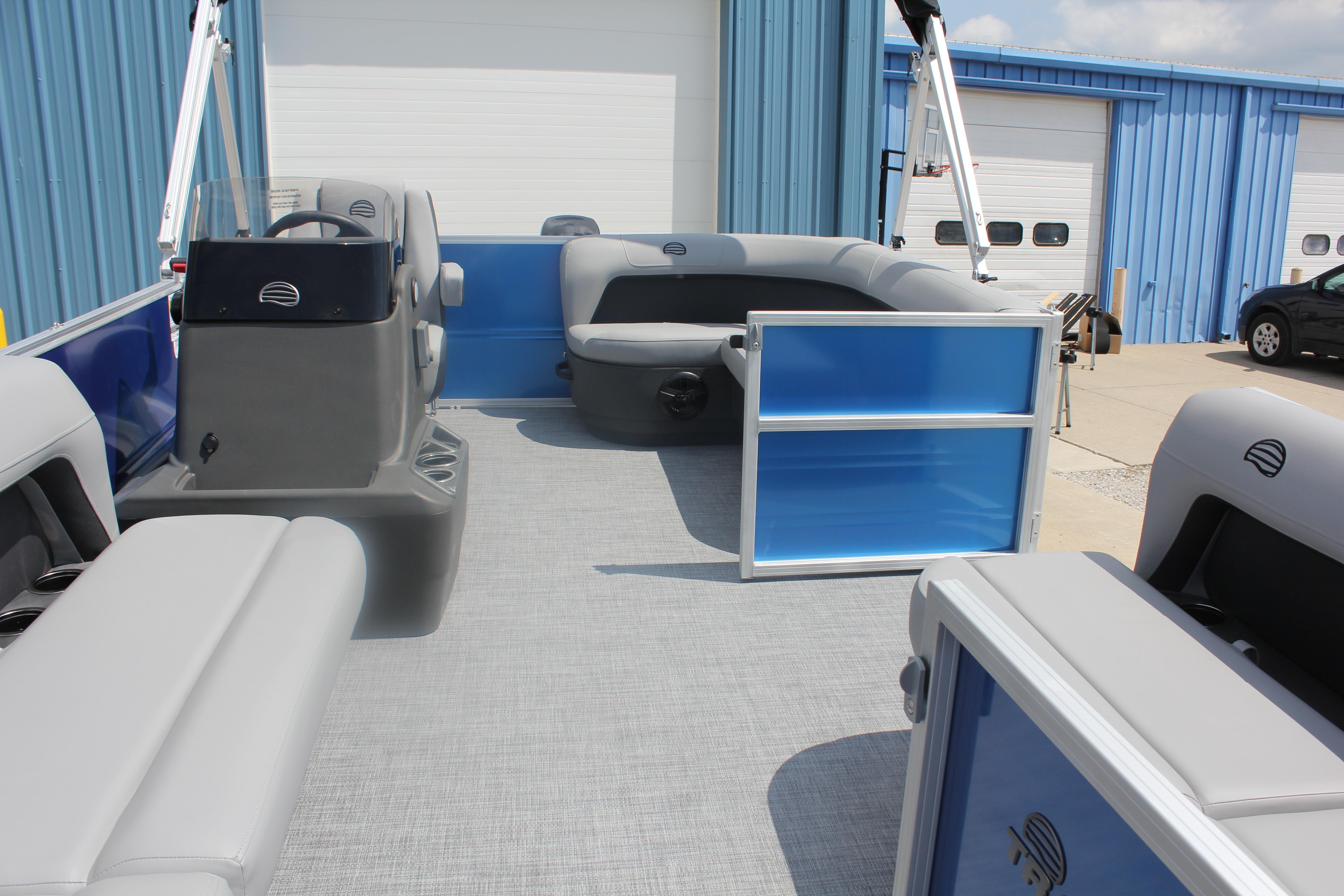 2026 Sun Tracker Party Barge 16 DLX pontoon boat with spacious seating and modern design.