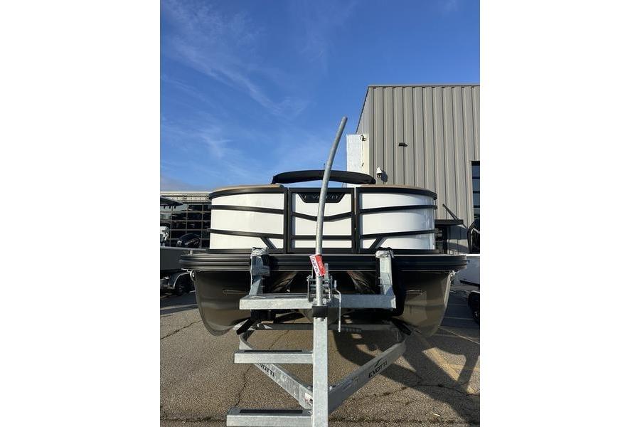 Front view of 2026 Evotti 523CS boat on trailer, parked outdoors.