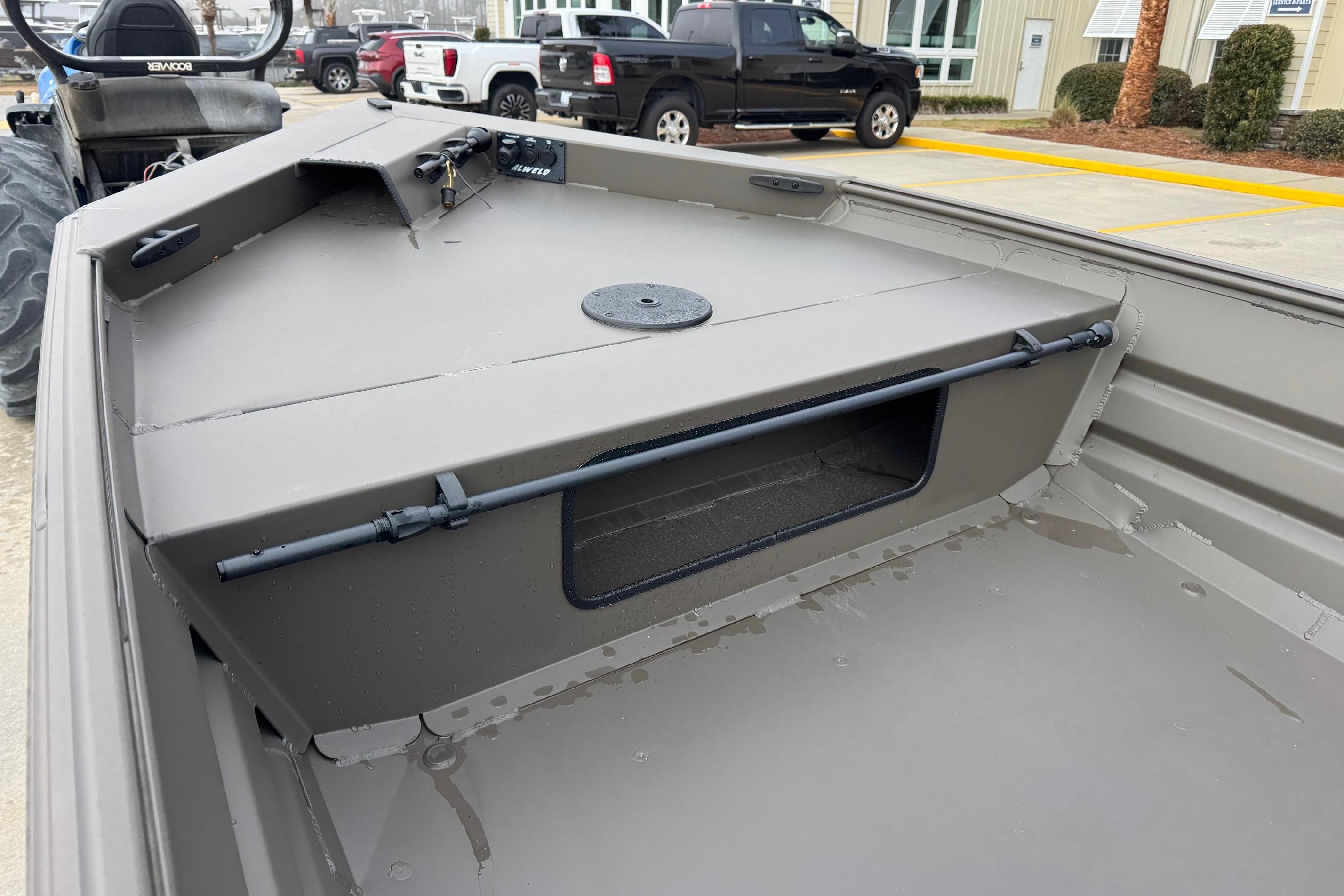2026 Alweld 1548VV Marsh boat interior with storage compartment and seating area.