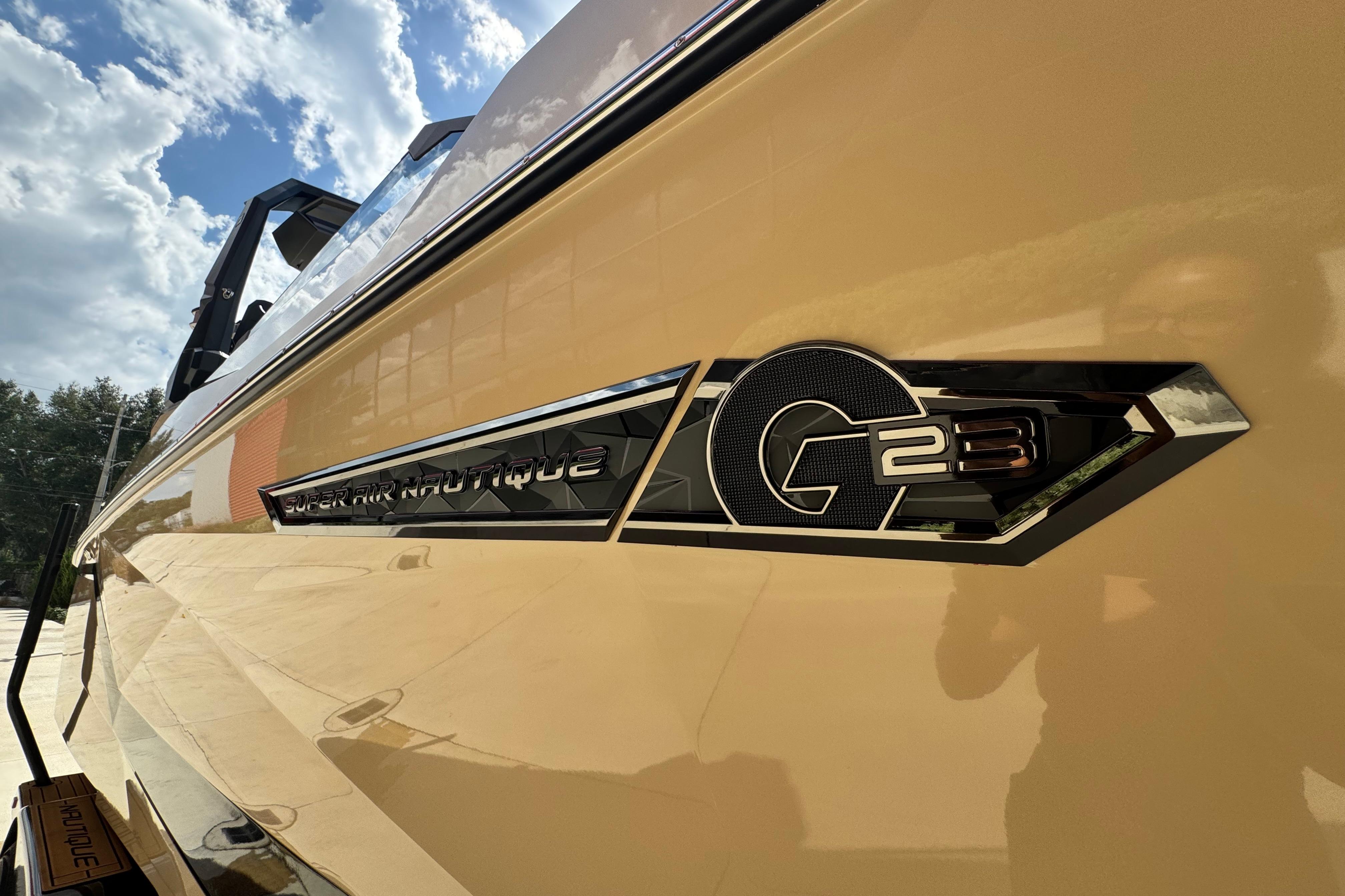 2026 Nautique Super Air Nautique G23 Paragon side view with logo detail.