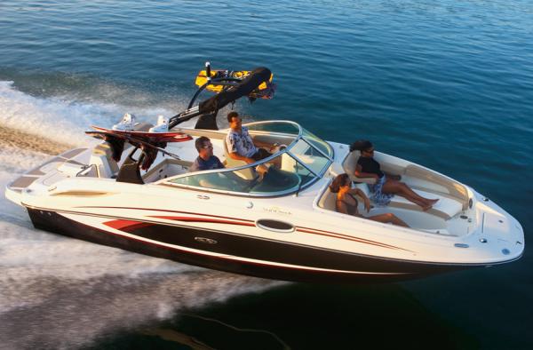 Manufacturer Provided Image: 2013 Sea Ray 260 Sundeck cruising on water with passengers.