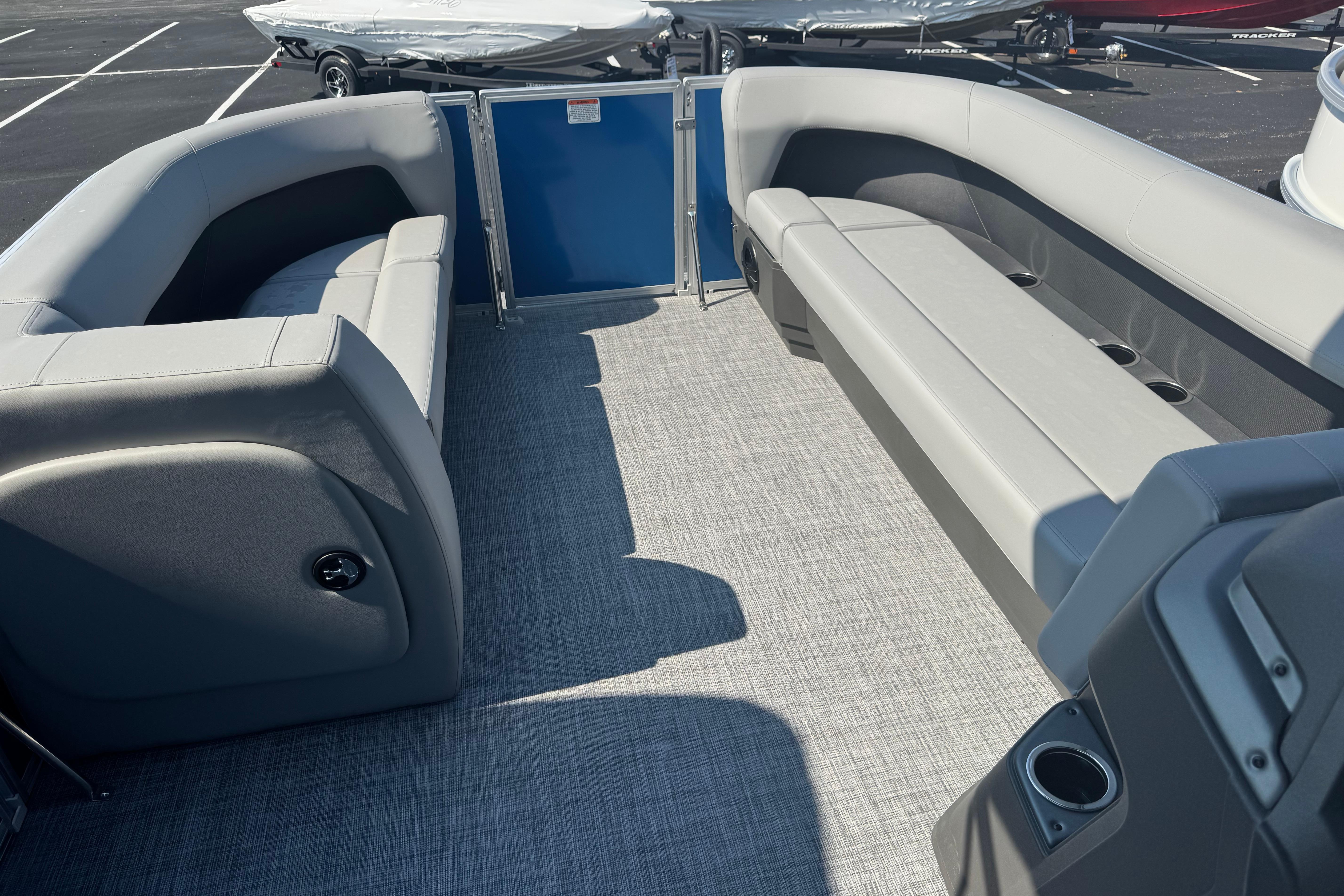2026 Sun Tracker Party Barge 18 DLX interior with spacious seating and modern design.