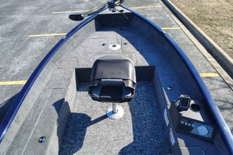 2026 Tracker Super Guide V-16 T boat interior with seating and control panel.