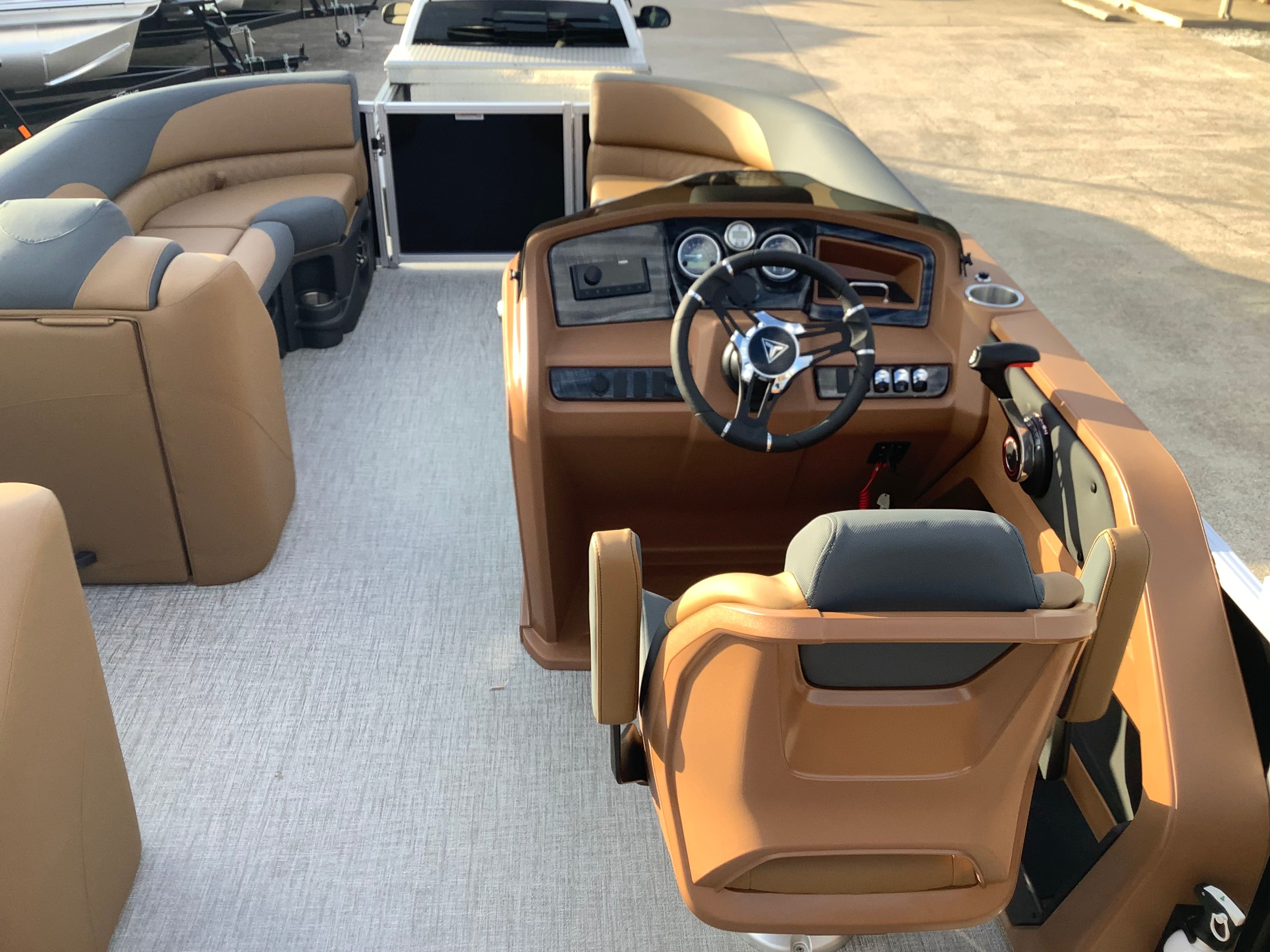 2026 Tahoe 2385 LTZ interior with luxurious steering wheel and seating.