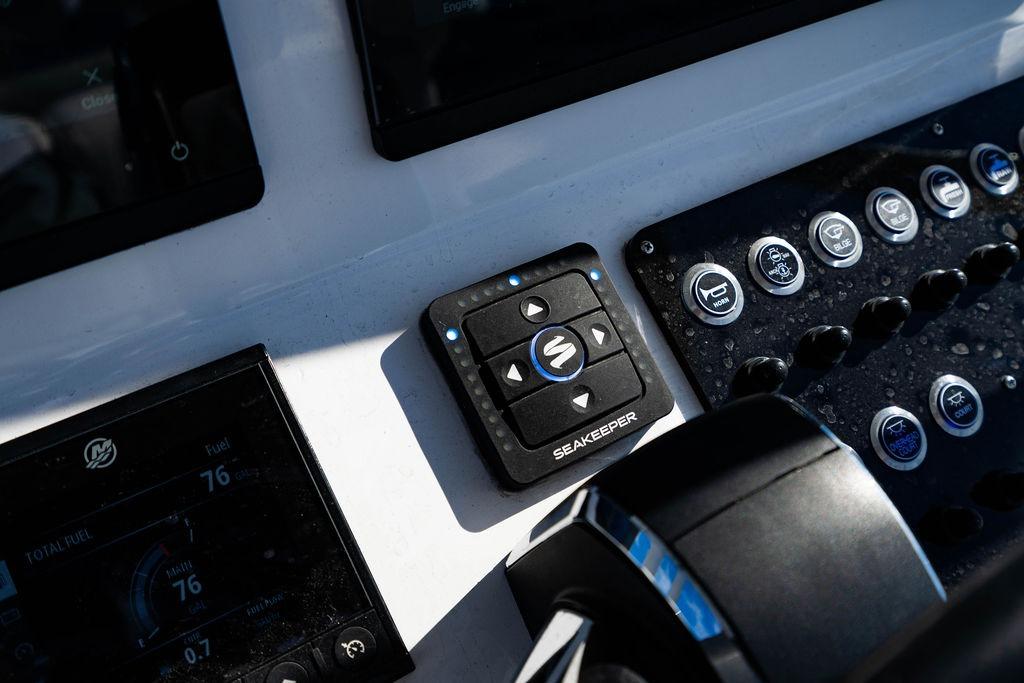 Control panel of 2024 Reef Runner 230 Open boat with Seakeeper system.