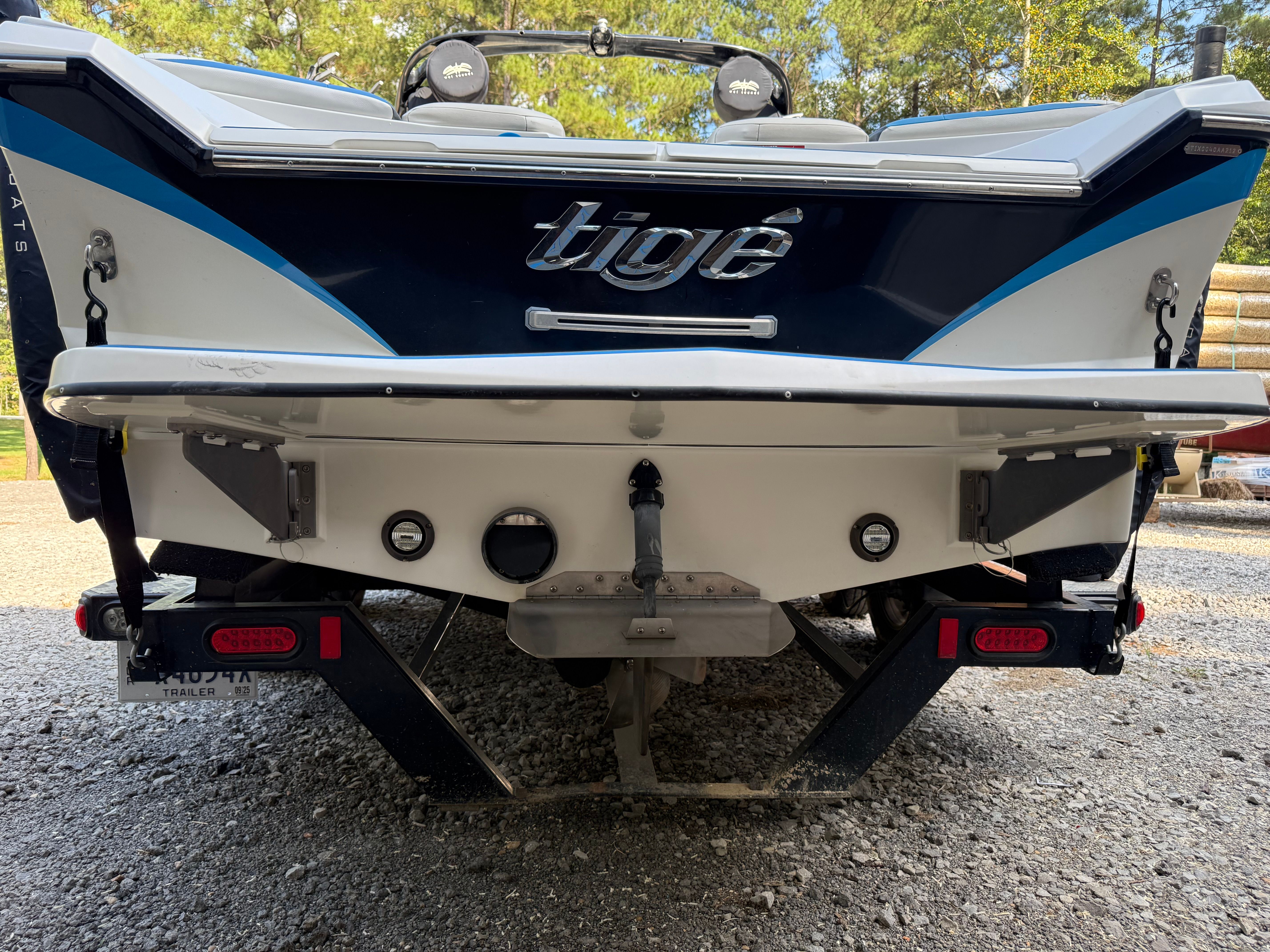 Rear view of a 2012 Custom Z3 boat on a trailer.
