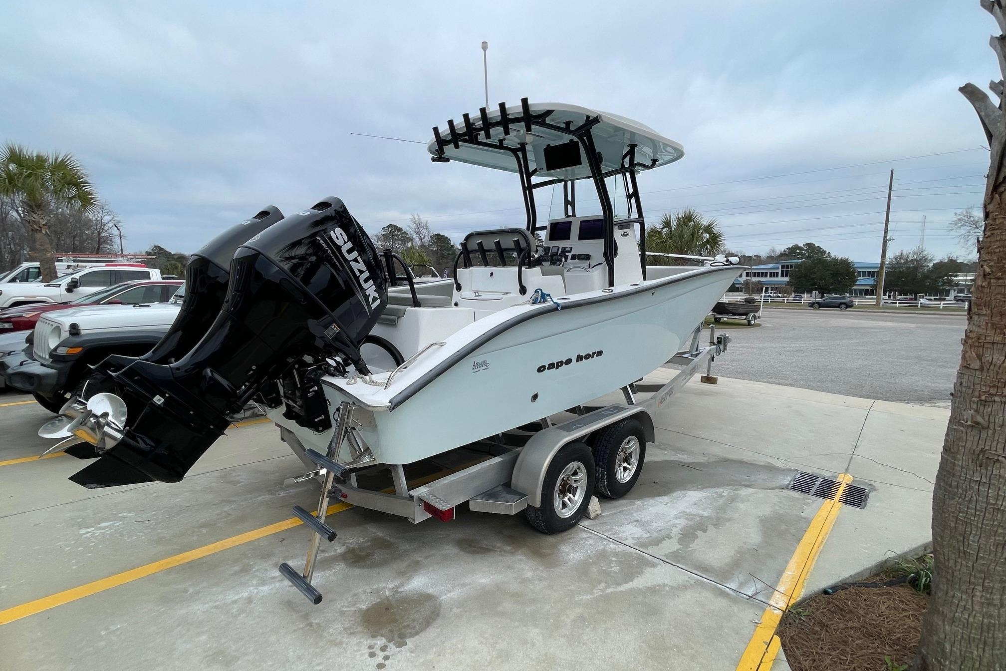 2023 Cape Horn 24 XS boat on trailer with Suzuki outboard motor.