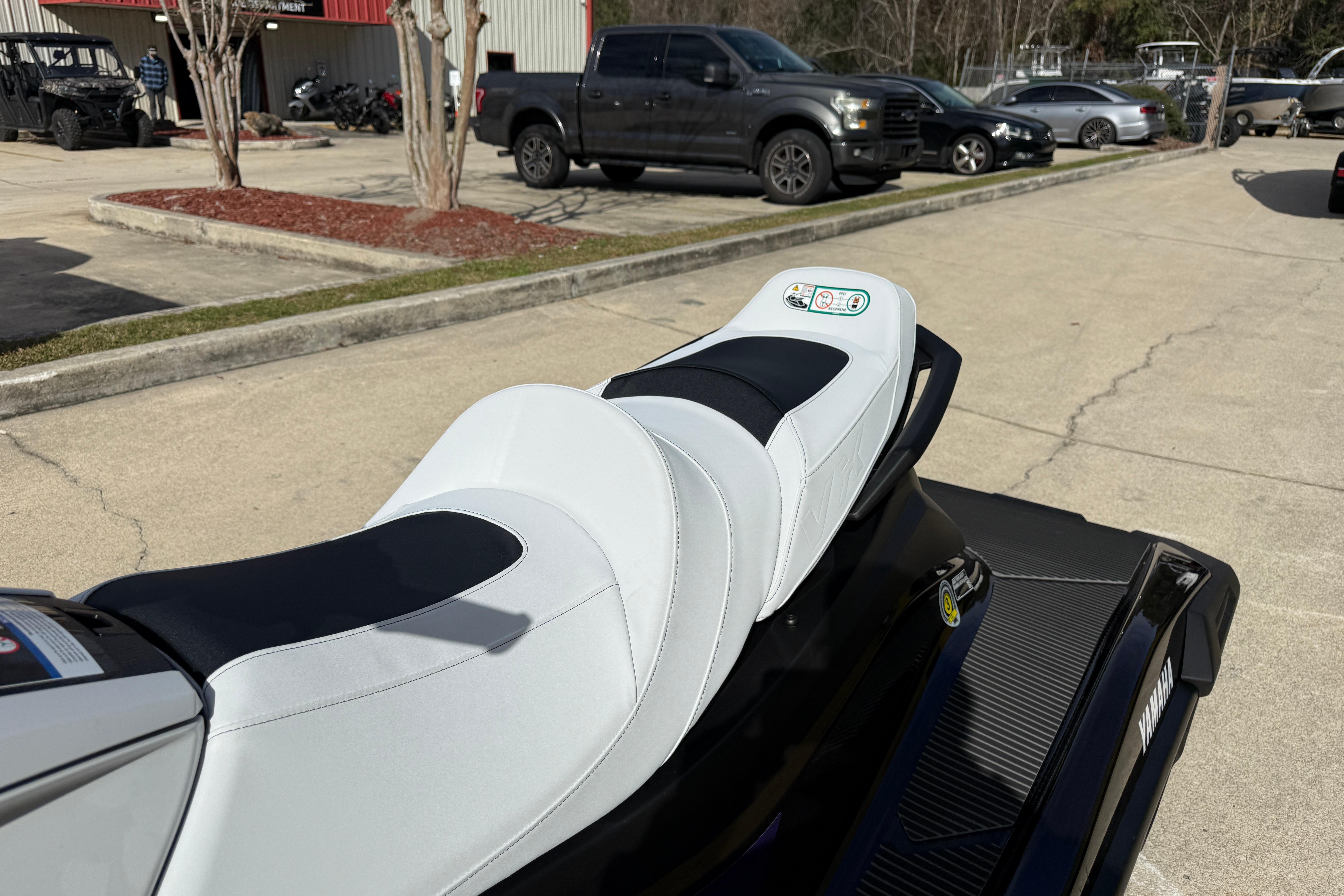2026 Yamaha WaveRunner VX Cruiser HO with sleek white and black seating, parked outdoors.