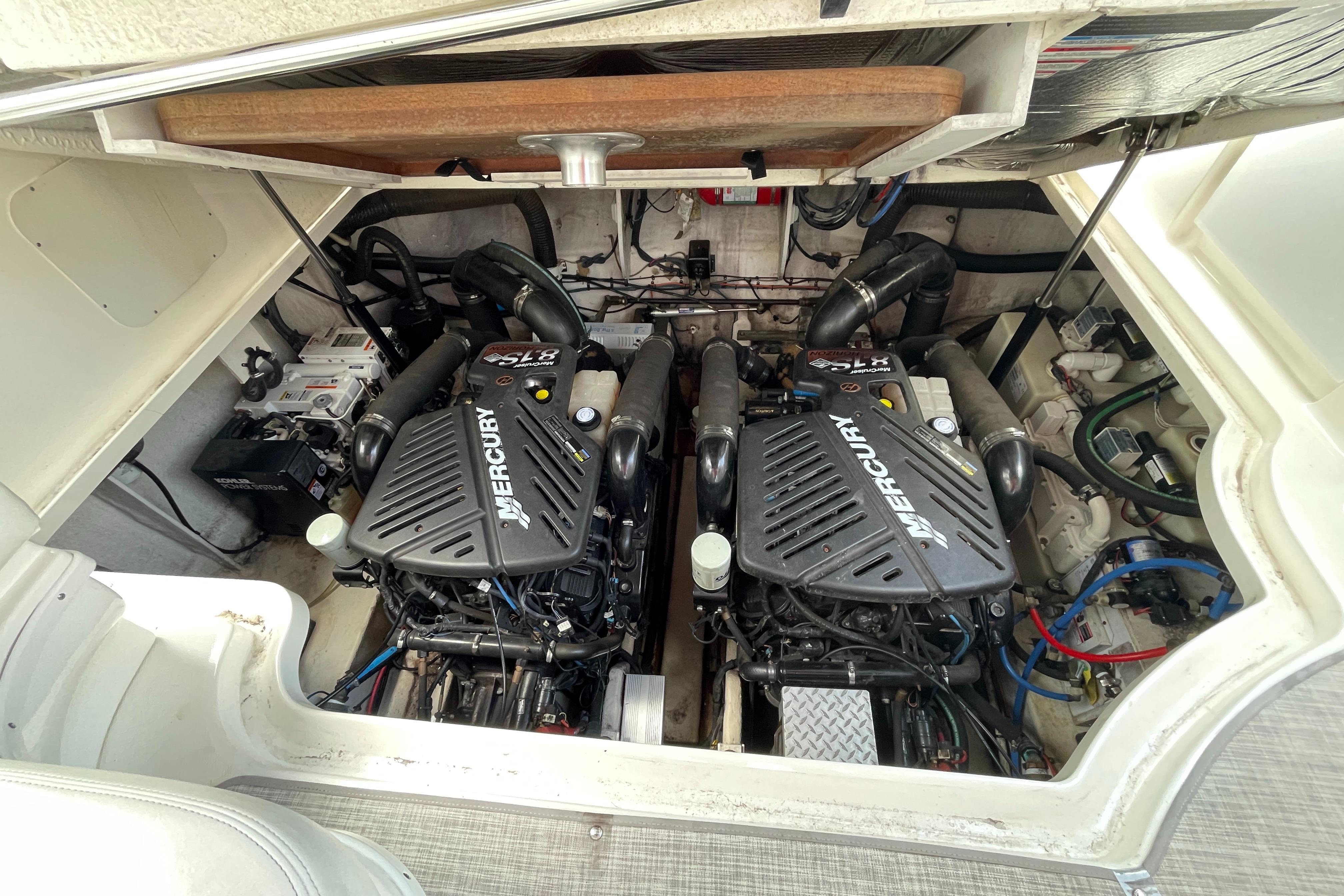 Engine compartment of 2007 Sea Ray 340 Sundancer with twin Mercury engines.