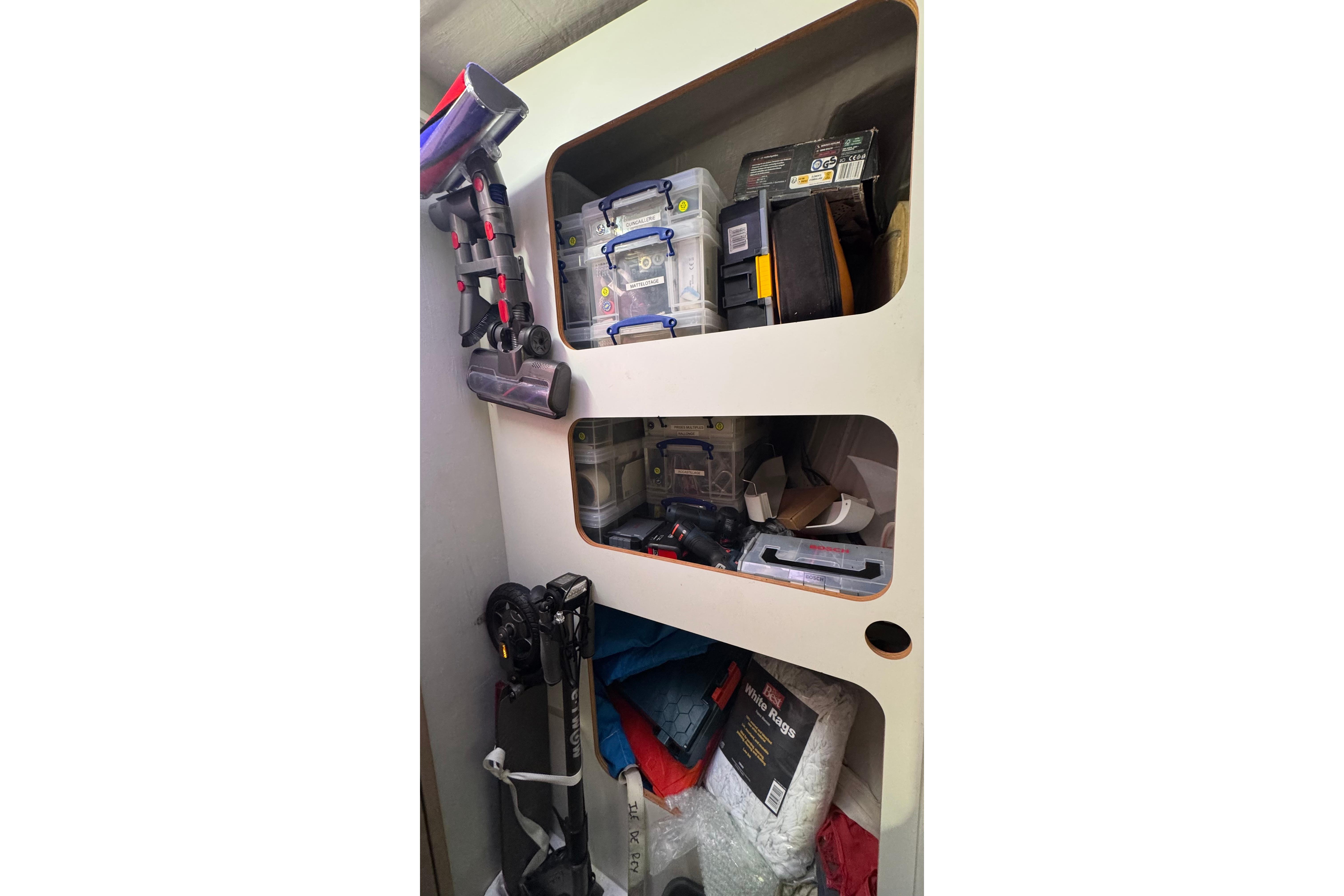 Storage area inside a 2020 Fountaine Pajot Saona 47, filled with tools and equipment.