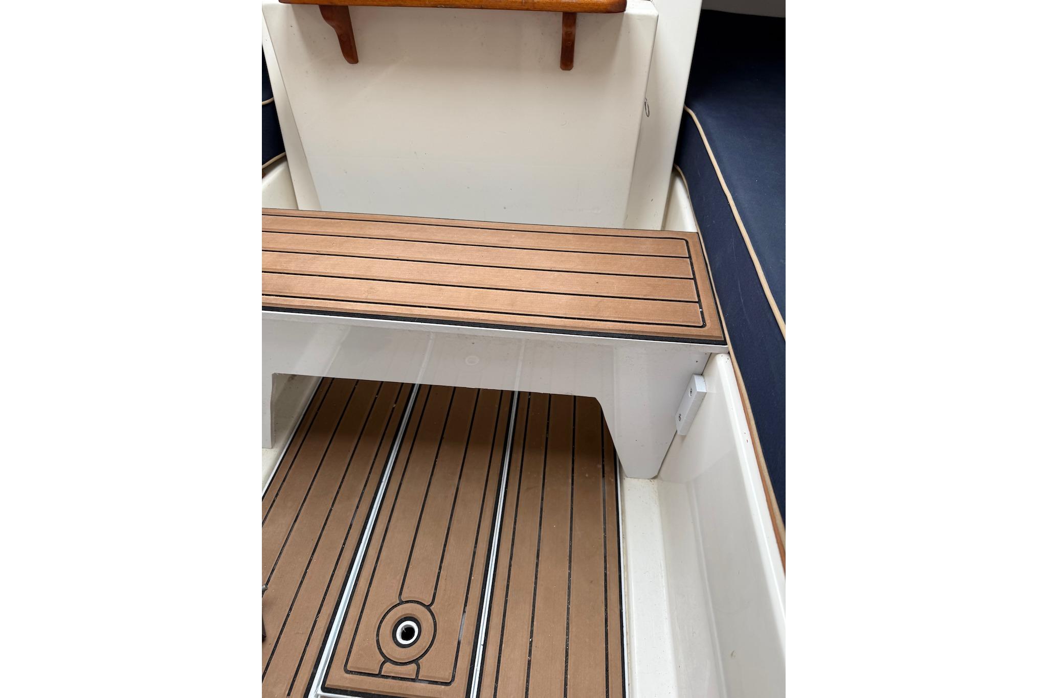2008 e Sailing Yachts e33 interior with wooden bench and flooring detail.