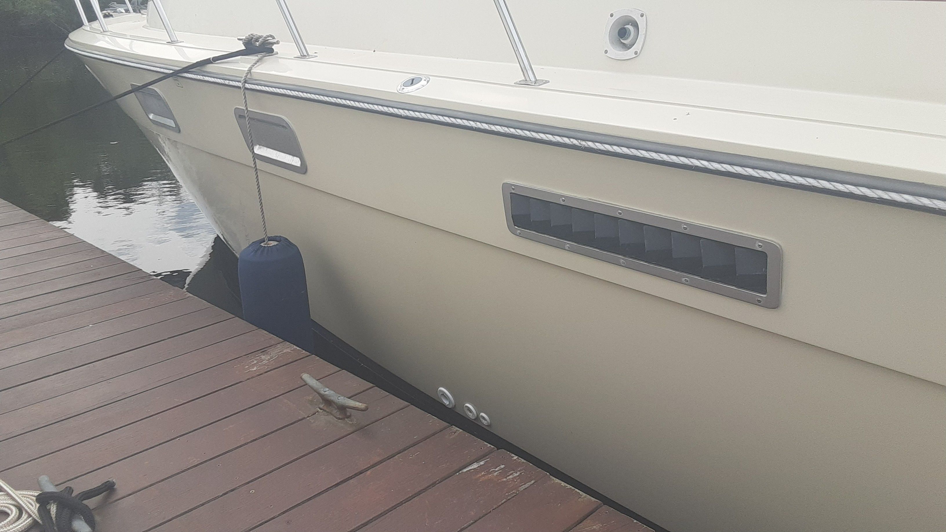 1985 Tiara Yachts 3100 Open docked at pier.