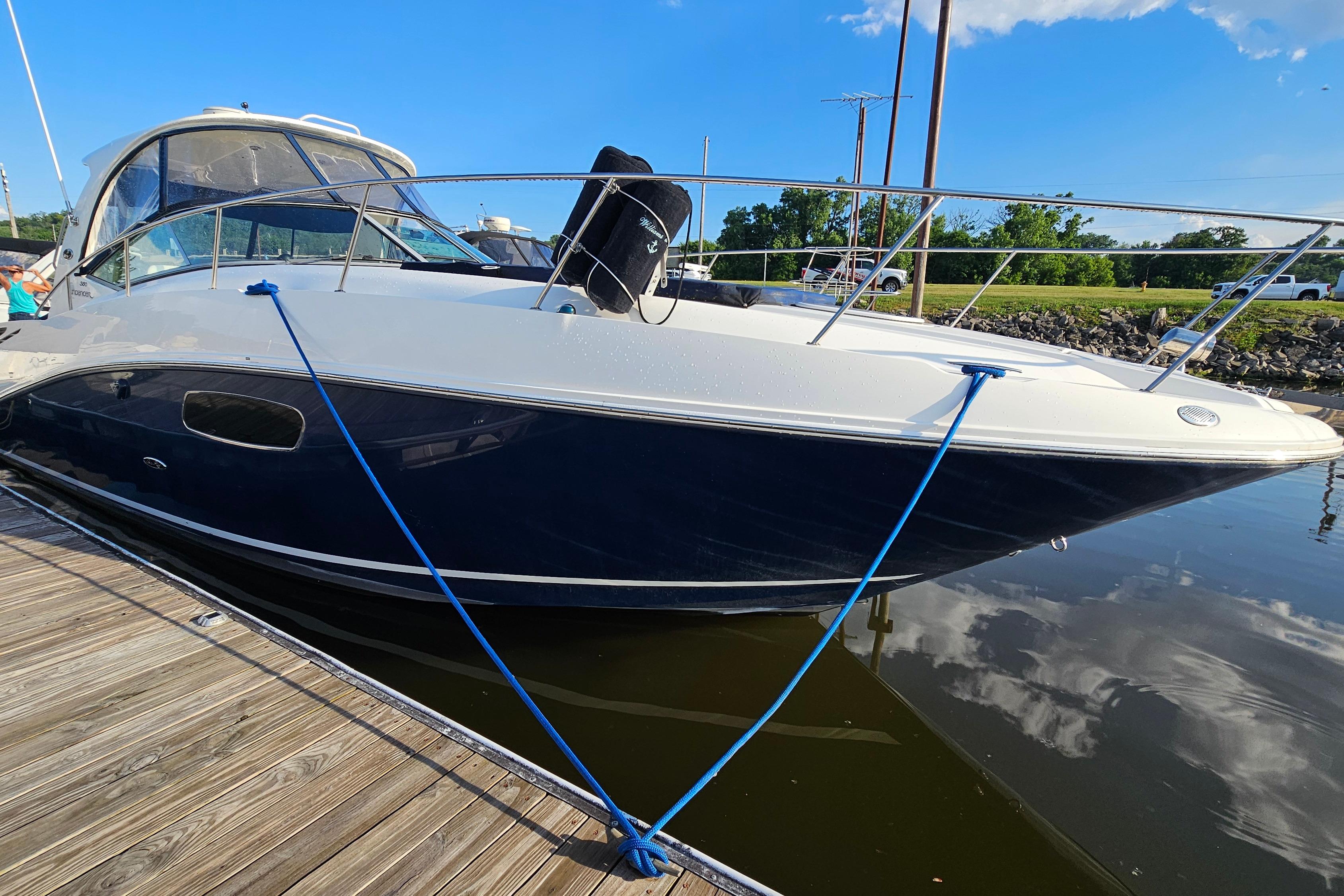 2008 Sea Ray Sundancer 350 docked, featuring sleek design and blue hull.